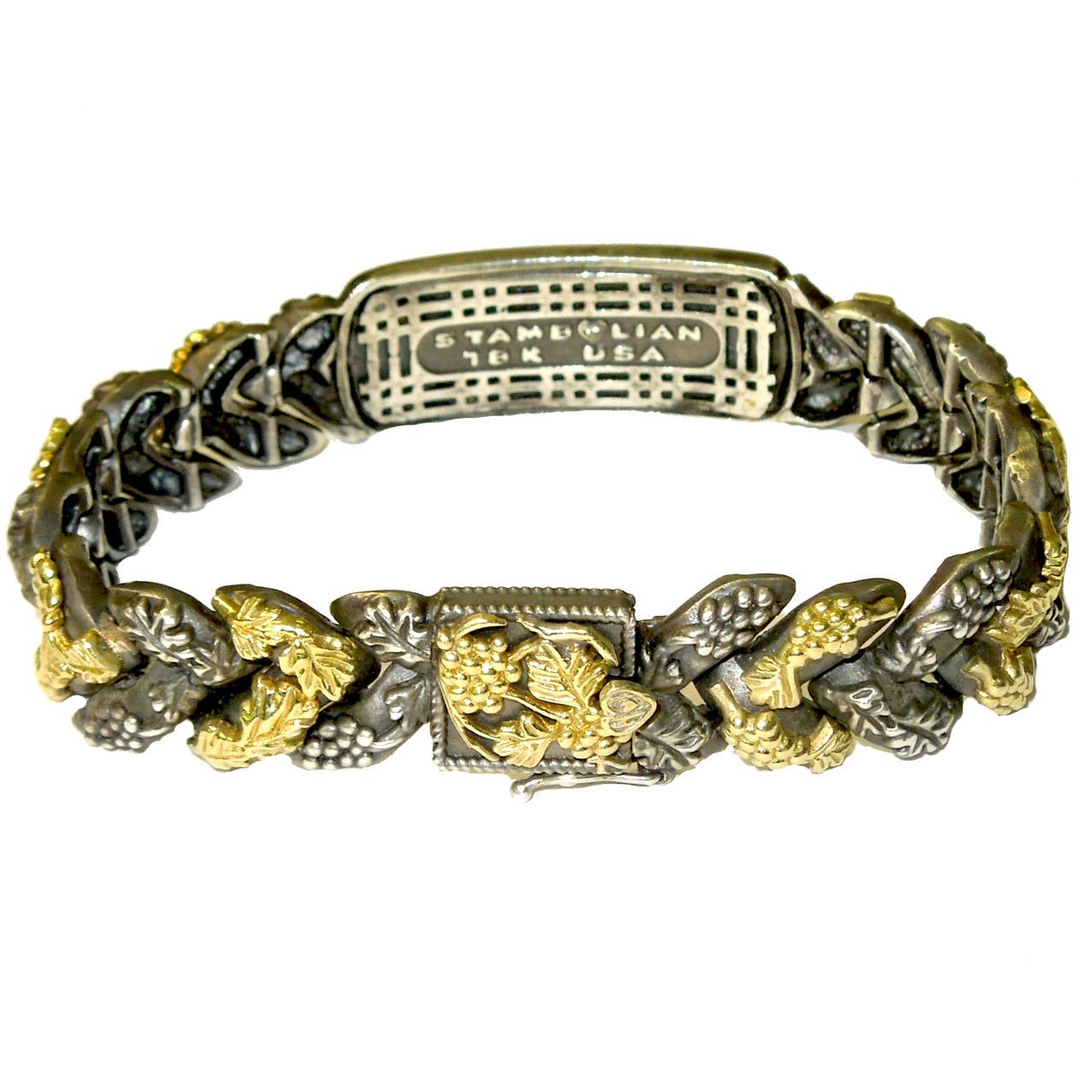 Stambolian Aged Silver 18K Gold Napa Valley Grapevine Mens Link Bracelet

Piece has grape vines throughout the piece in both Gold & Silver

Aged Silver bar with 18K Gold Grape Vines covers the entire center of the bracelet

Gold and silver