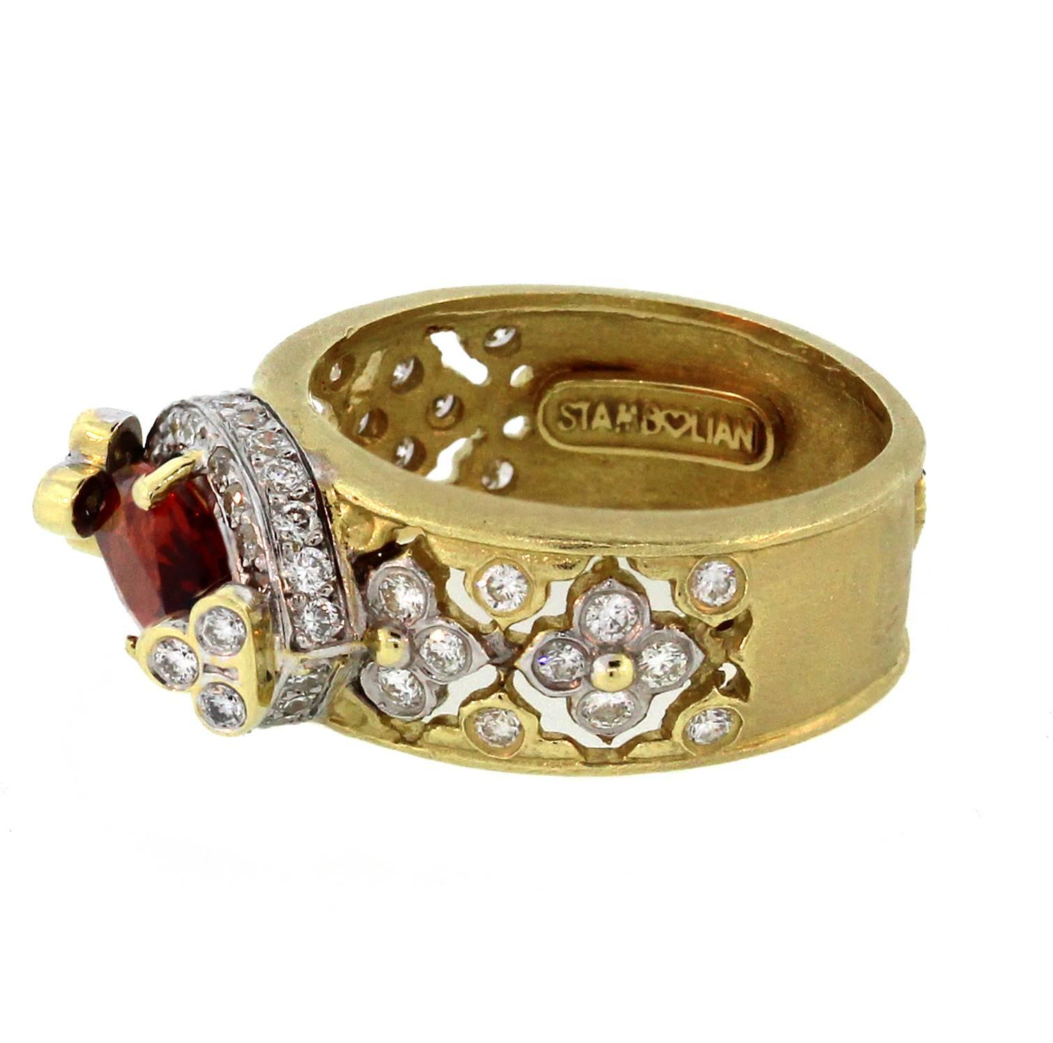 18K Yellow Gold Ring with Marquis Spessartite Garnet Center and Diamonds

This Mandarin orange spessartite Garnet has beautiful color. Is marquis cut and very clean. Weights 1.69ct.

0.70. G Color, VS Clarity Diamonds are set throughout rest of the