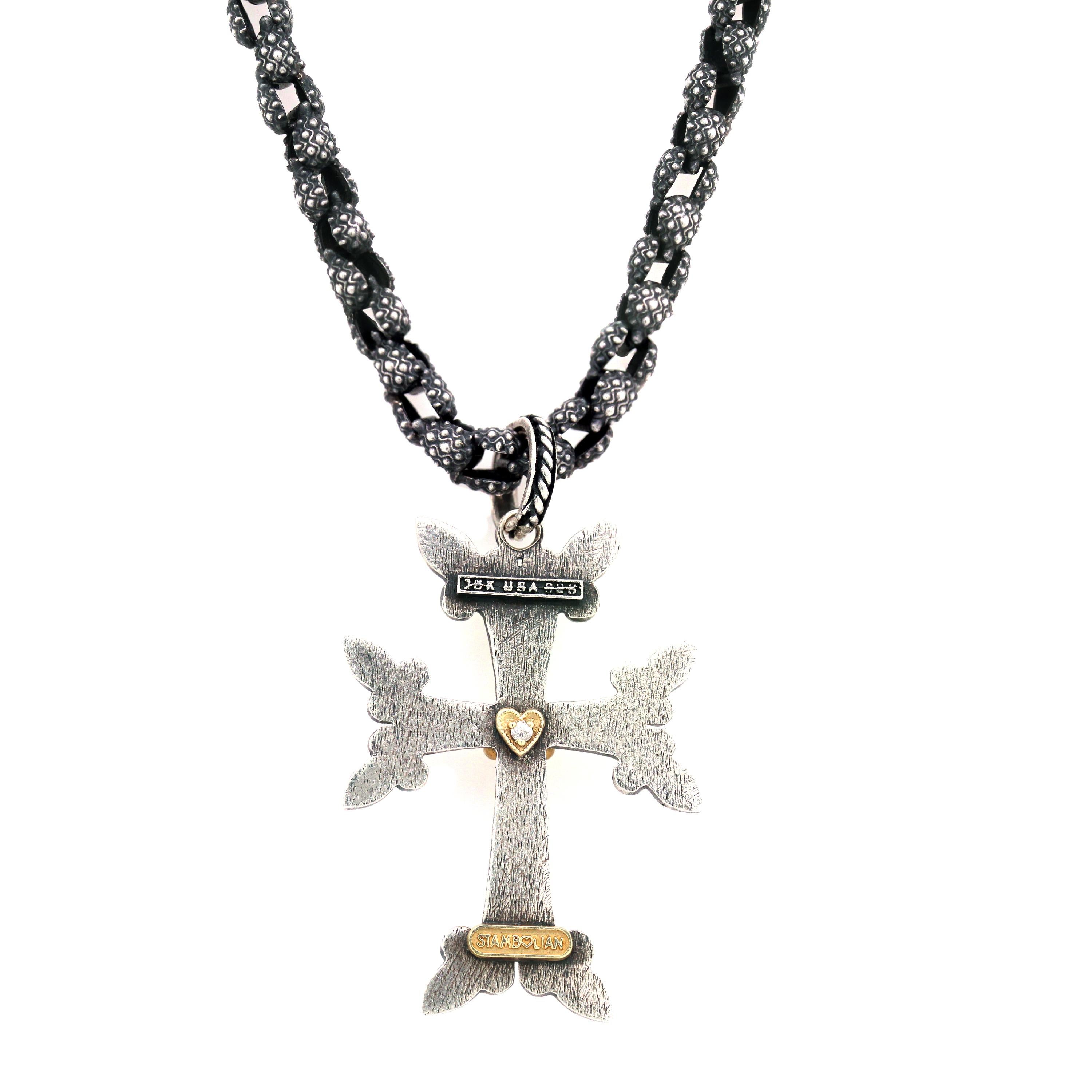Aged Sterling Silver and 18K Gold Cross Pendant with Hand Made Chain by Stambolian

This unique cross by Stambolian illustrates the true beauty in simplicity. The cross is crafted in sterling silver with a solid 18K gold center with one single