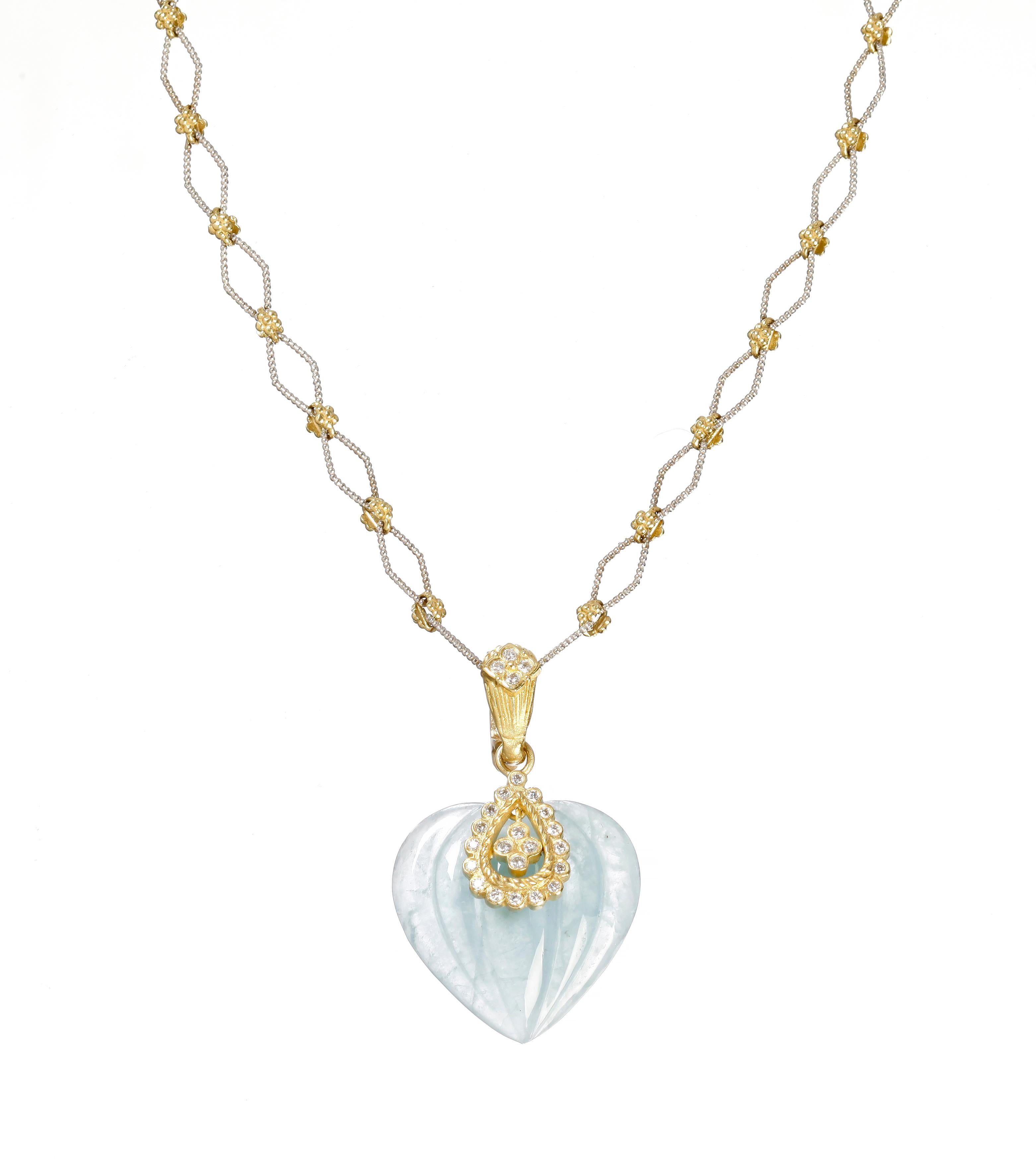 IF YOU ARE REALLY INTERESTED, CONTACT US WITH ANY REASONABLE OFFER. WE WILL TRY OUR BEST TO MAKE YOU HAPPY!

18K Yellow Gold and Diamond Milky Aquamarine Heart Enhancer Pendant with Two-Tone Gold Chain

Special-cut, Milky Aquamarine pendant has