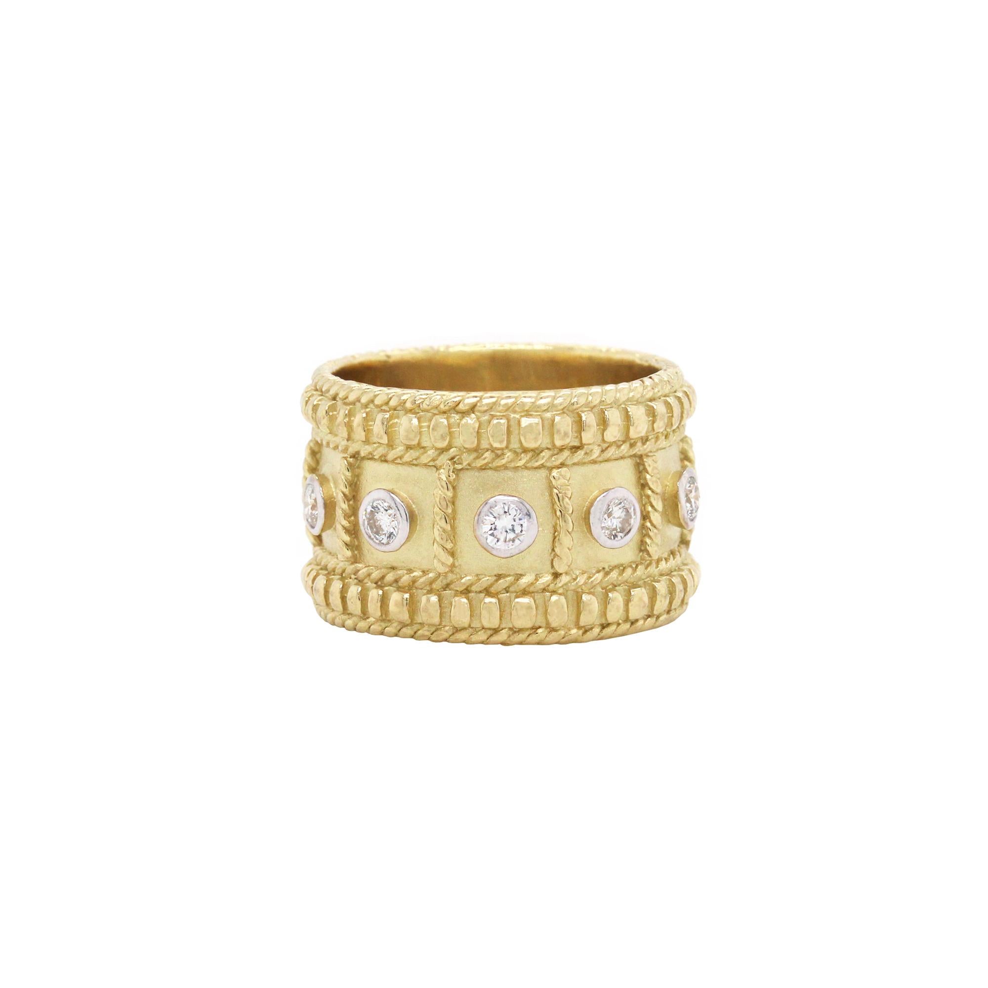 18K Yellow Gold and Diamond Cigar Wide Band Ring by Stambolian

0.60 carat G color, VS clarity diamonds total weight

Band is a size 6.25.

0.50 inch (13.35mm) band width.

Signed Stambolian and has the Trademark 