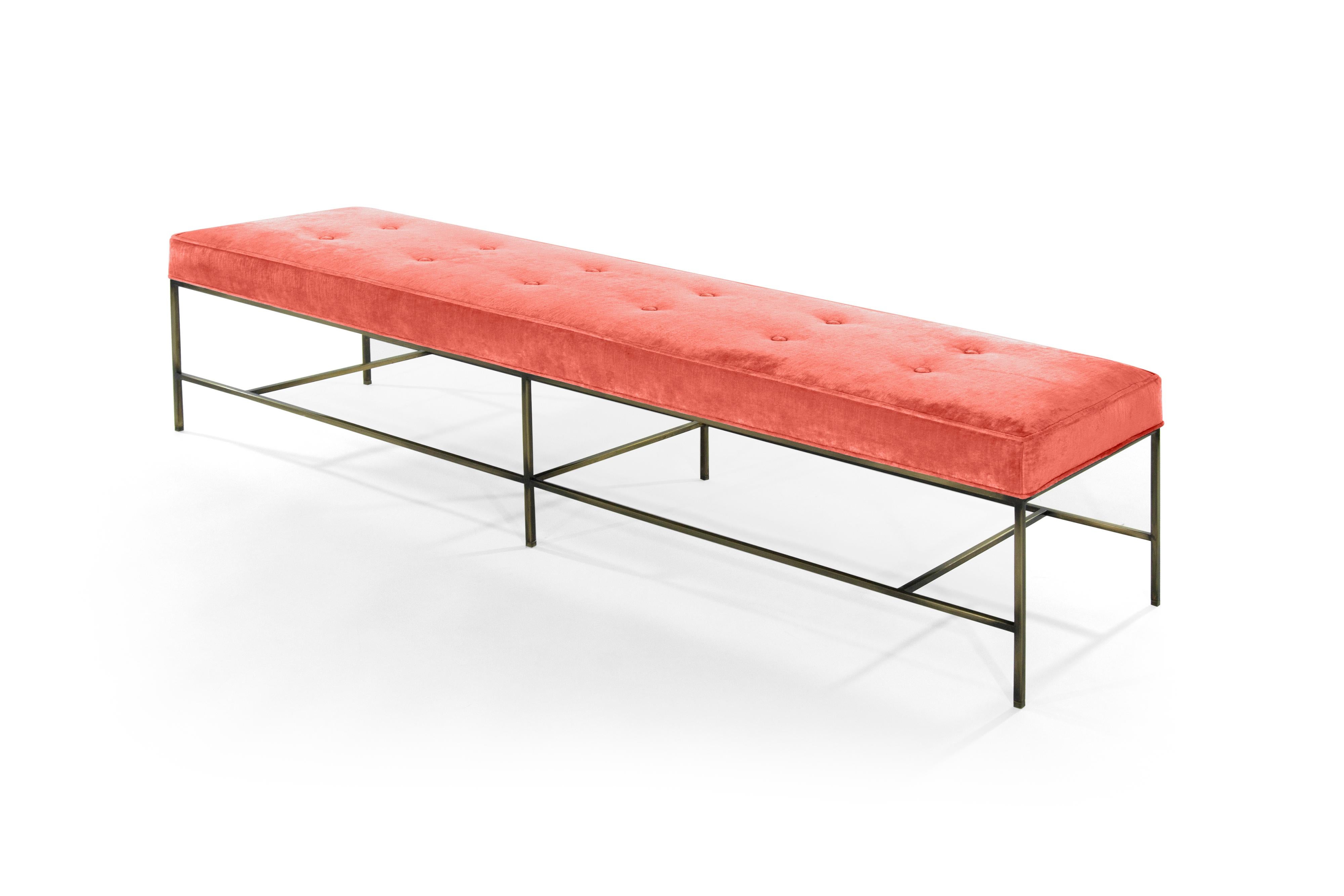 The Architectural Bench is light and angular with impeccable lines. The extra-long cushion upholstered in colorful coral chenille is uplifted with a bronze frame. Paul McCobb’s design influence shines through with masterful minimalism. Slender legs
