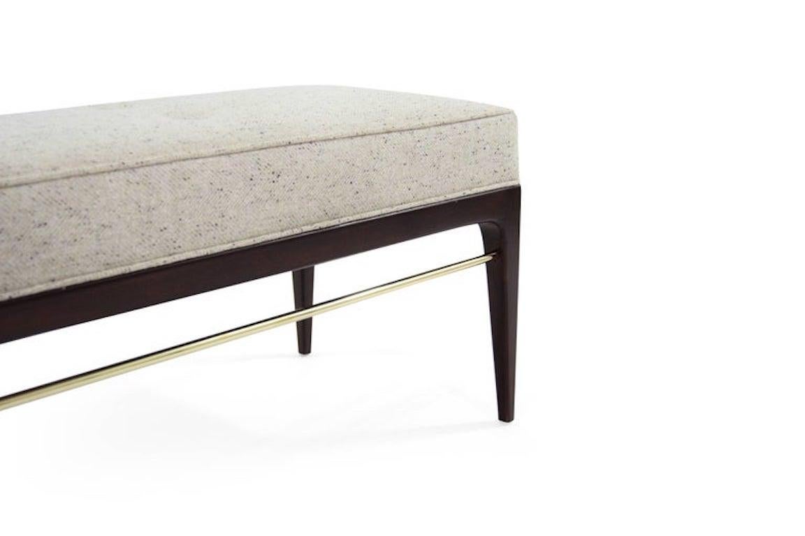Draw clean lines with contemporary furniture inspired by the Mid-Century Modern Legend, Edward Wormley (1907-1995), a leading American designer. Echoing the brass bar below, this wool-upholstered cushion has lines of crisp welting around the edge.