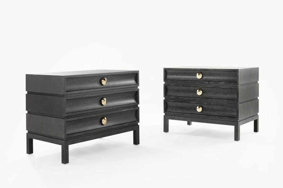 Inspired by the iconic designer Paul Frankl, these rustic modern end tables blend timeless elegance with contemporary flair. The oversized drawer frames and subtly curved fronts create a playful asymmetry, while notched sides add a unique touch,