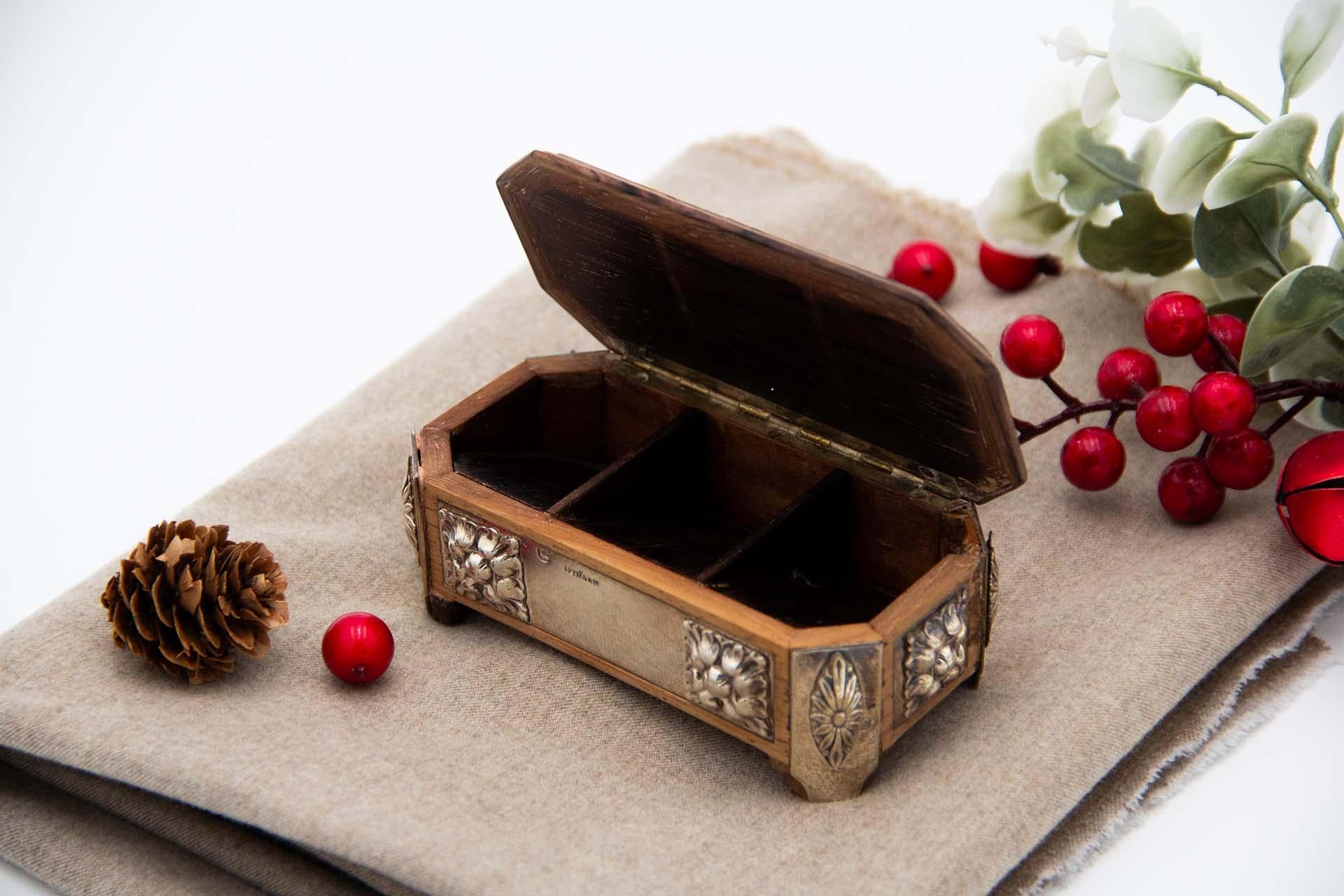 European Stamp box in rosewood with embossed silver applications and set on four feet For Sale