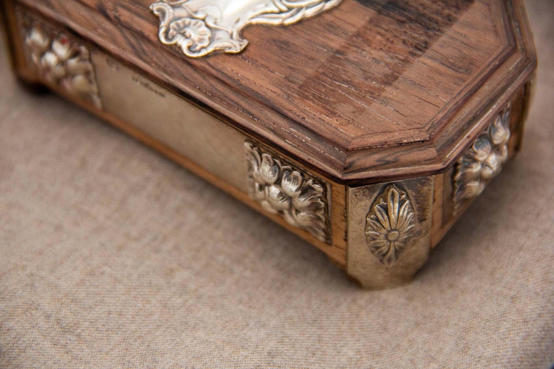19th Century Stamp box in rosewood with embossed silver applications and set on four feet For Sale