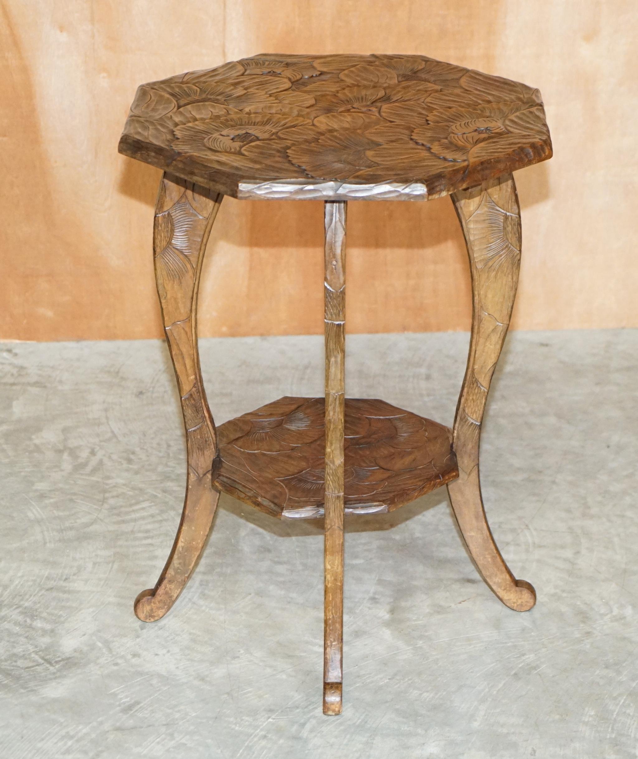 We are delighted to offer for sale this lovely large Liberty’s London 1905 oriental mahogany occasional table with original stamp to the base

A good-looking piece, its hand carved from top to bottom with floral detailing, I have variations of
