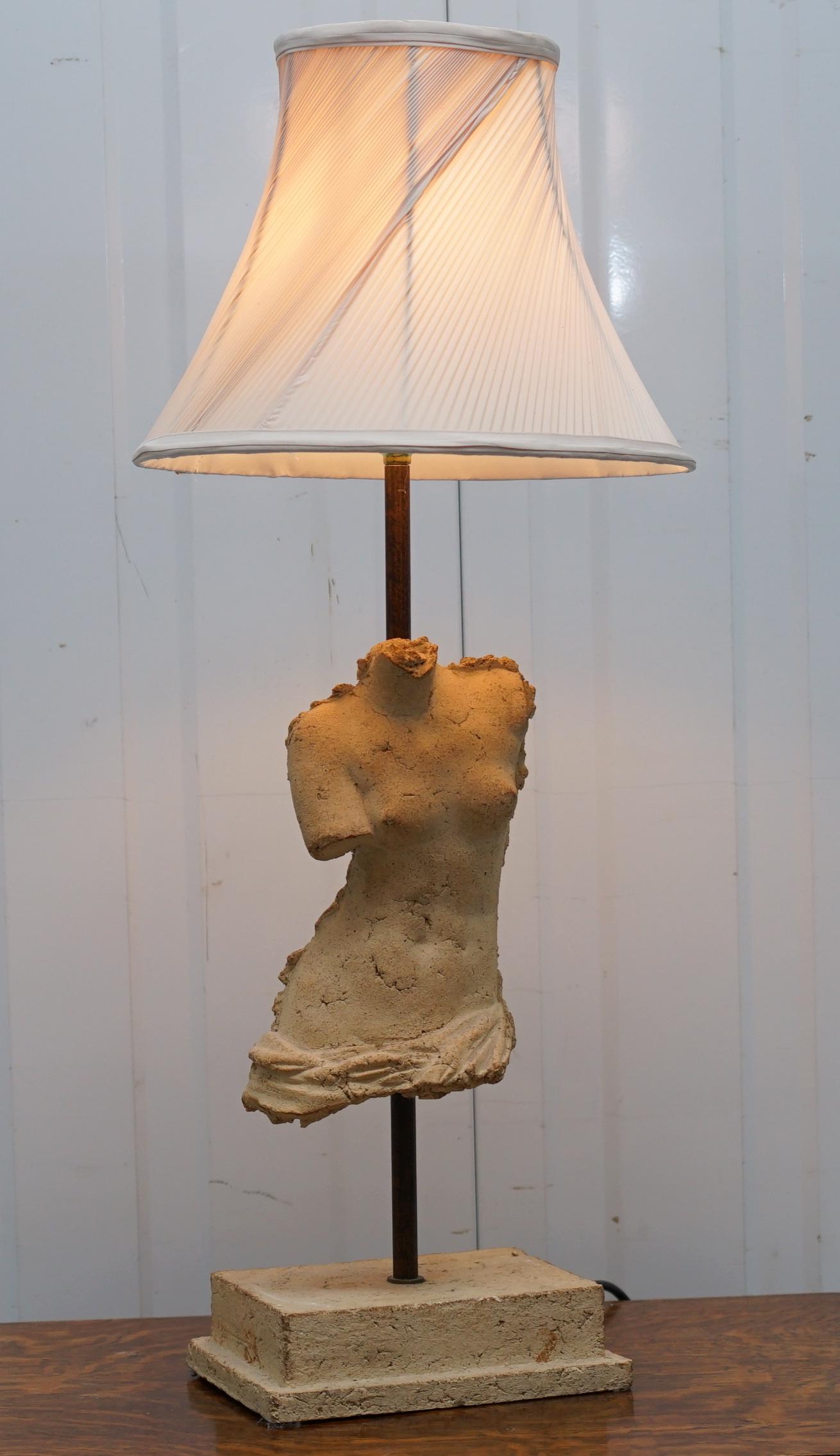 We are delighted to offer for sale this lovely original Atelier Michel Cayla stone torso table lamp

A very good looking and well-made lamp, exceptionally decorative and I think the only one of its type

The torso is height adjustable, the shade