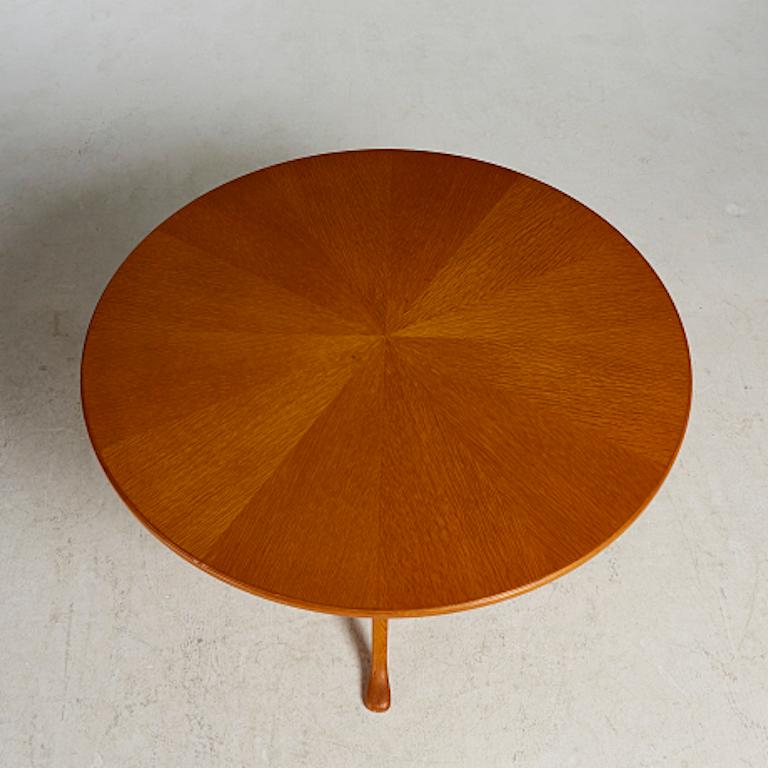 Carl Malmsten (1888-1972) designed round table. Table has three tripod legs and is branded with designers initials, 