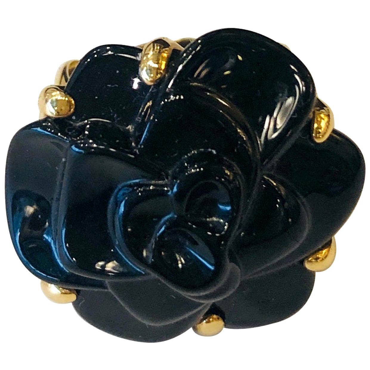 Stamped Chanel Black Onyx and 18-Karat Gold Camellia Cocktail Ring For Sale