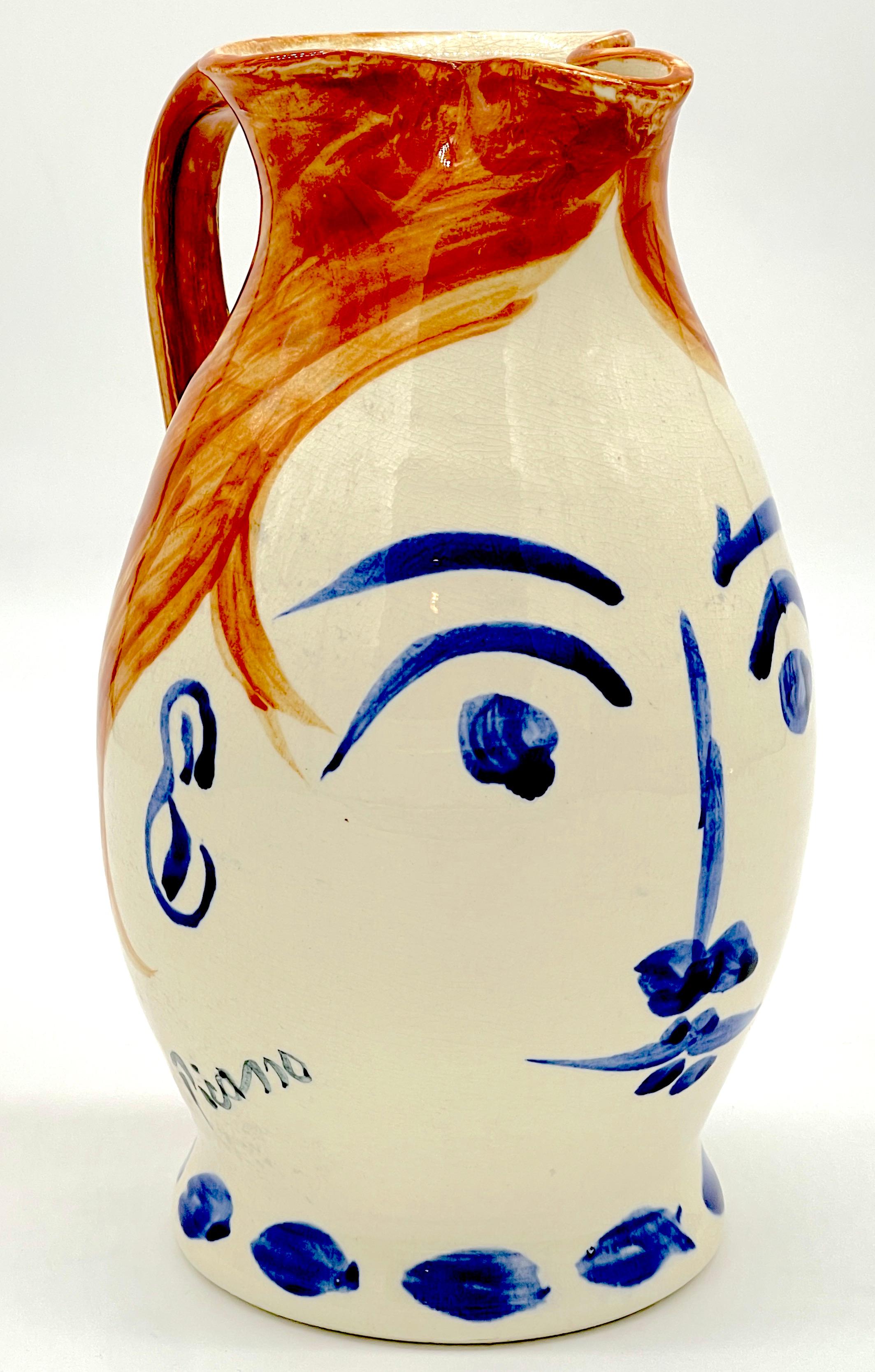 Stamped Edition Padilla Picasso Pottery 'Chope Visage' Pitcher  
After Pablo Picasso, Signed on the front  'Picasso' in blue script 
Stamped 'Fem co  1994 Edition 5A /500 Picasso by Padilla Mexico'

Enjoy the artistic legacy of the Padilla Pablo