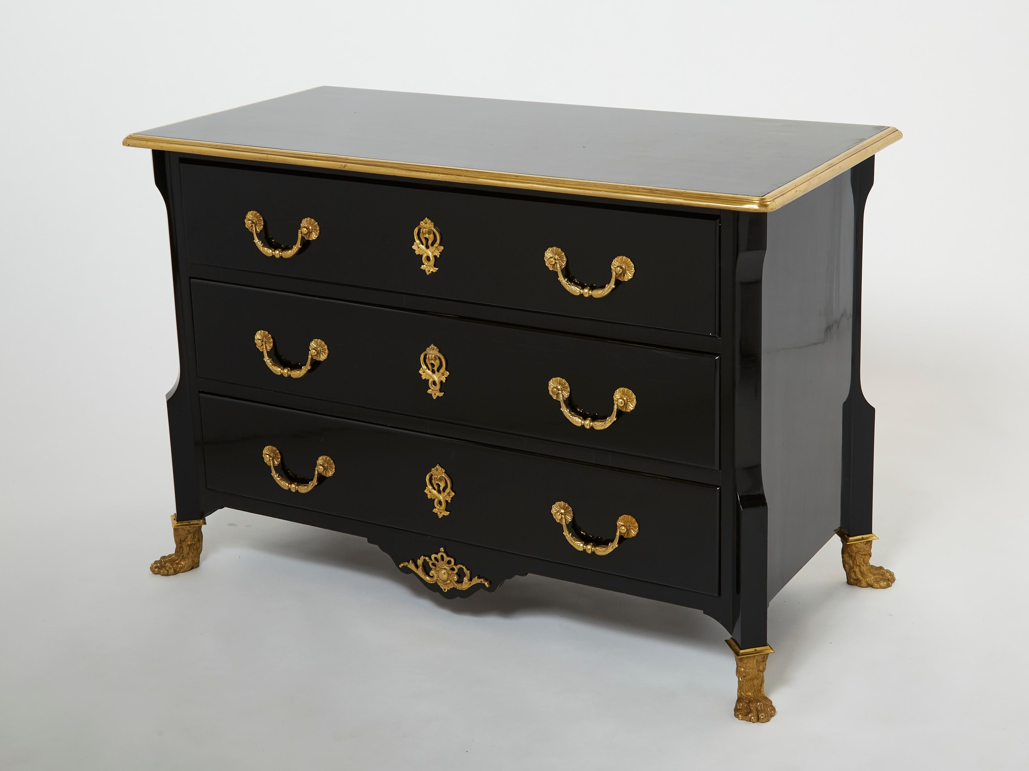 An exciting example of French design firm Maison Jansen early neoclassical pieces, this French Regency-style commode from the 1950s is imposing. Made from solid mahogany, fully ebonized, varnished and French polished, this stamped Jansen chest of