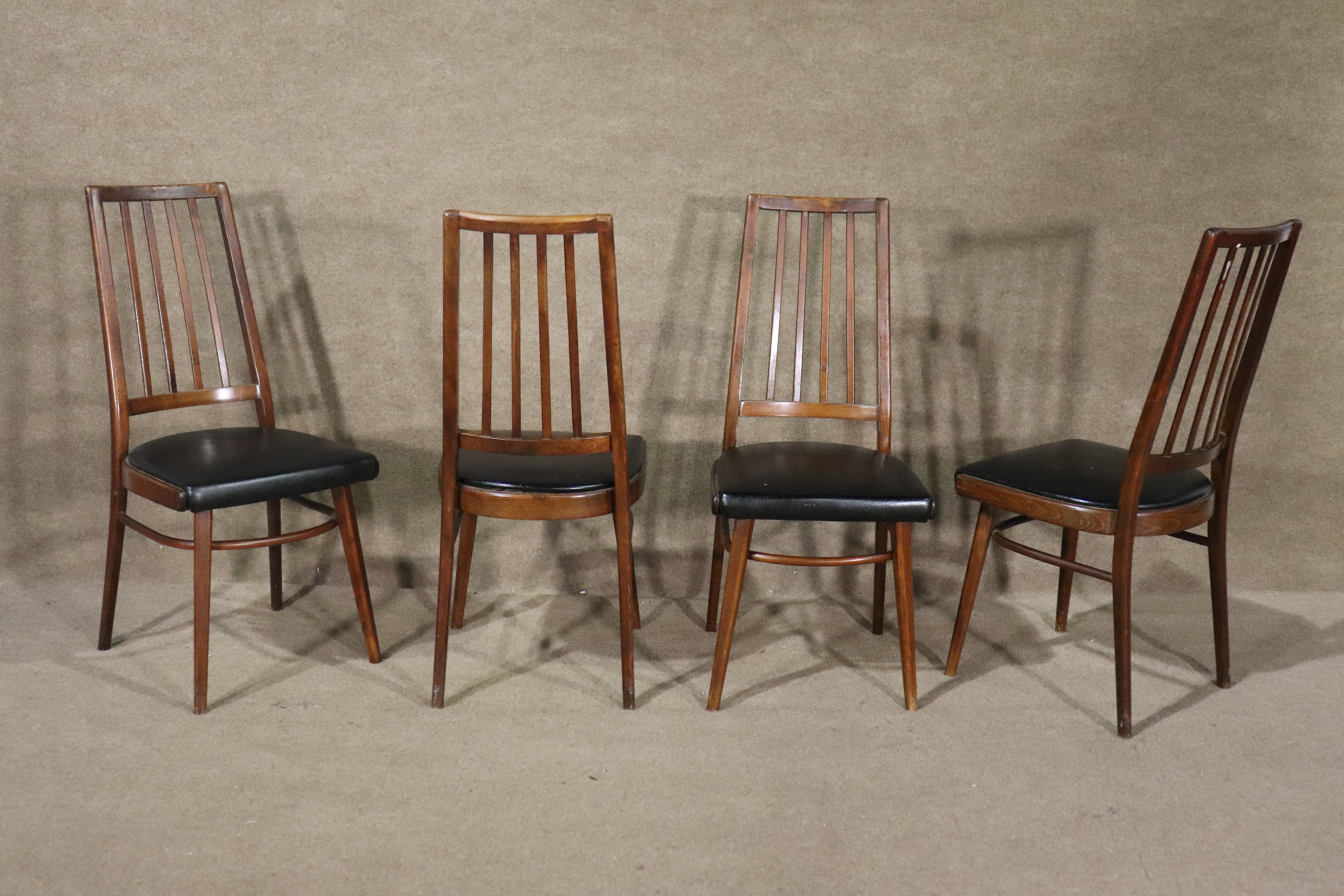 Set of four mid-century dining chairs in the style of Niels Koefoed's 'Eve' chairs. Made by Ligna Czechoslovakia with long, slender back rails and bentwood leg runner.
Please confirm location NY or NJ