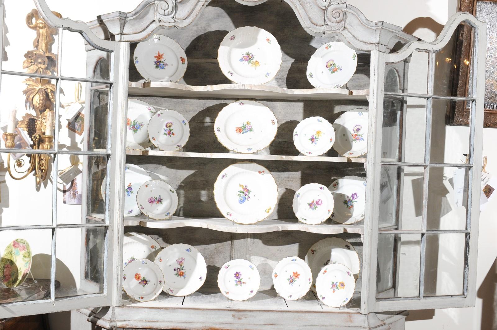 Hand-Painted Stamped Royal Copenhagen China Set with Hand Painted Floral Décor and Gilt Trim