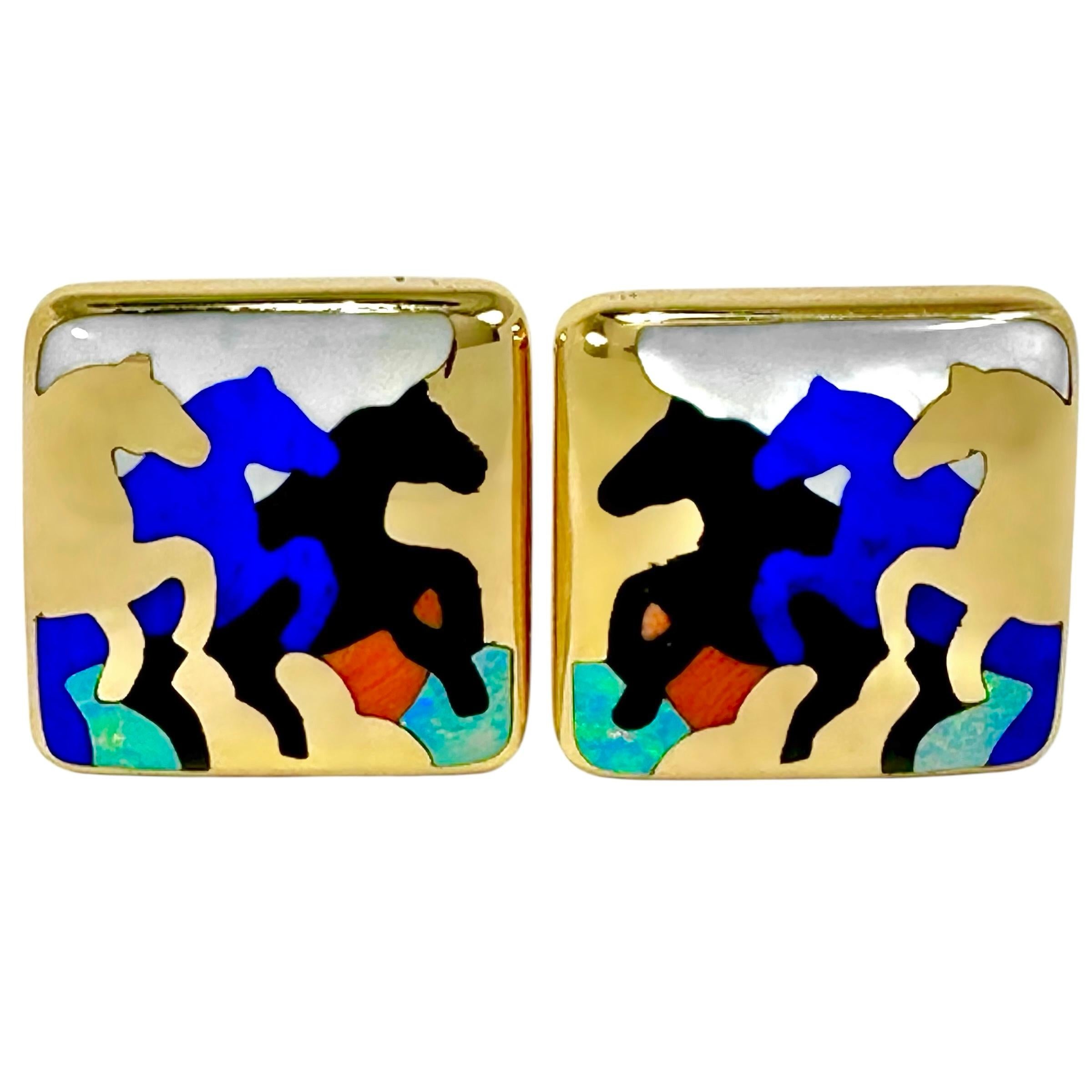 There a few jewelers in the world who have ever surpassed the formidable house of Asch Grosbardt in the deft and imaginative use of hard stone inlay in fine jewelry. This pair depict three horses on each, all at a hard gallup. All horses are