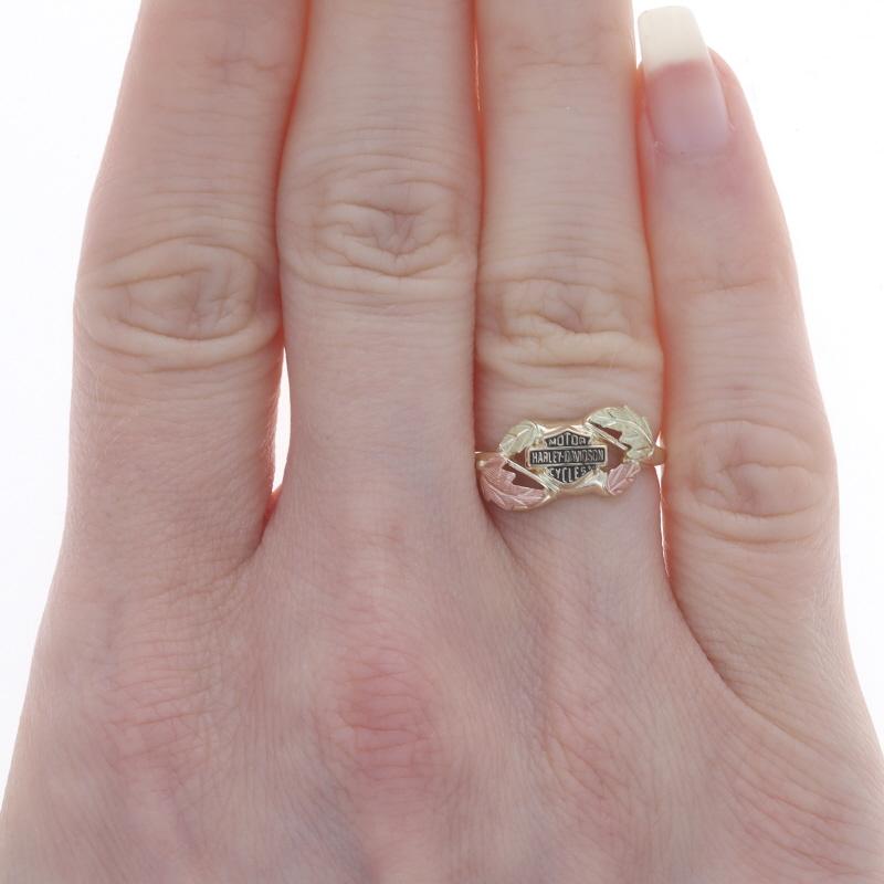 Size: 5 1/4
Sizing Fee: Up 3 sizes for $35 or Down 2 sizes for $30

Brand: Stamper Harley-Davidson
Design: Black Hills Gold

Metal Content: 10k Yellow Gold, 10k Rose Gold, & 10k Green Gold

Material Information
Enamel
Color: Black

Style: