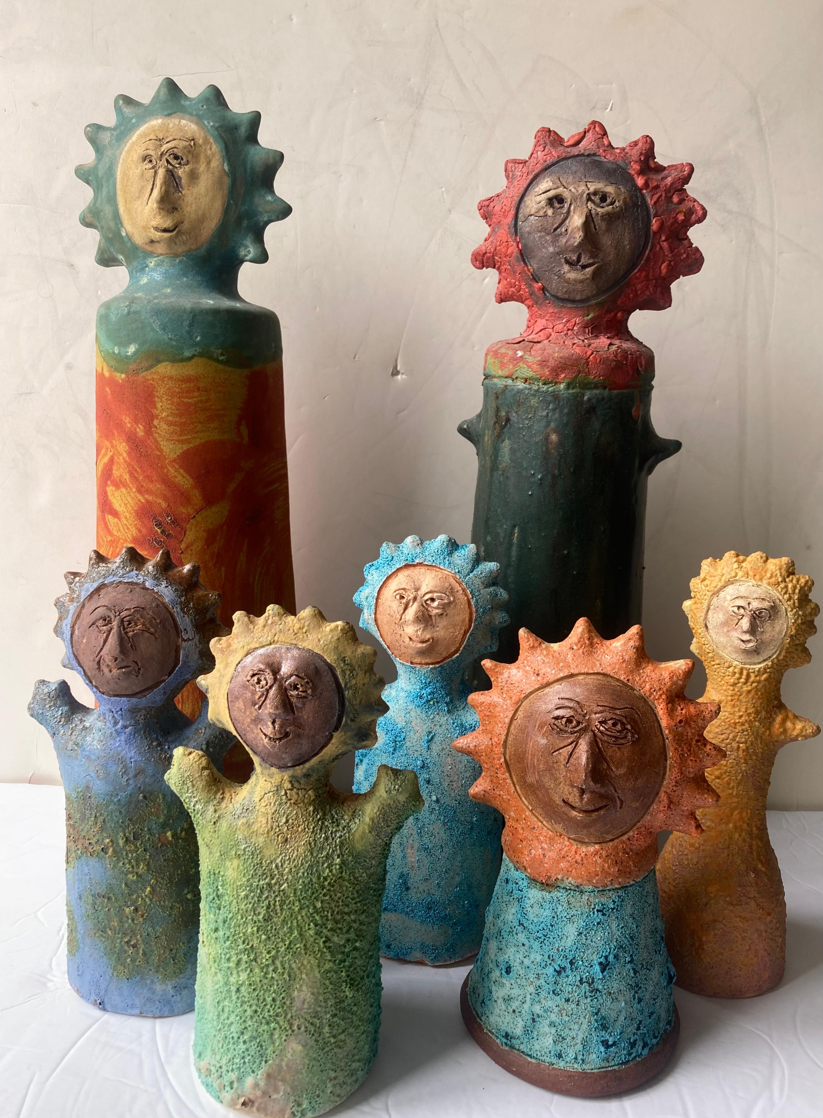 Beautiful collection of Sun People , attb to Stan Bitters , this are very well known pieces by the artist , beautiful glazes , no signed .Different sizes from 7 to 17 inches high .