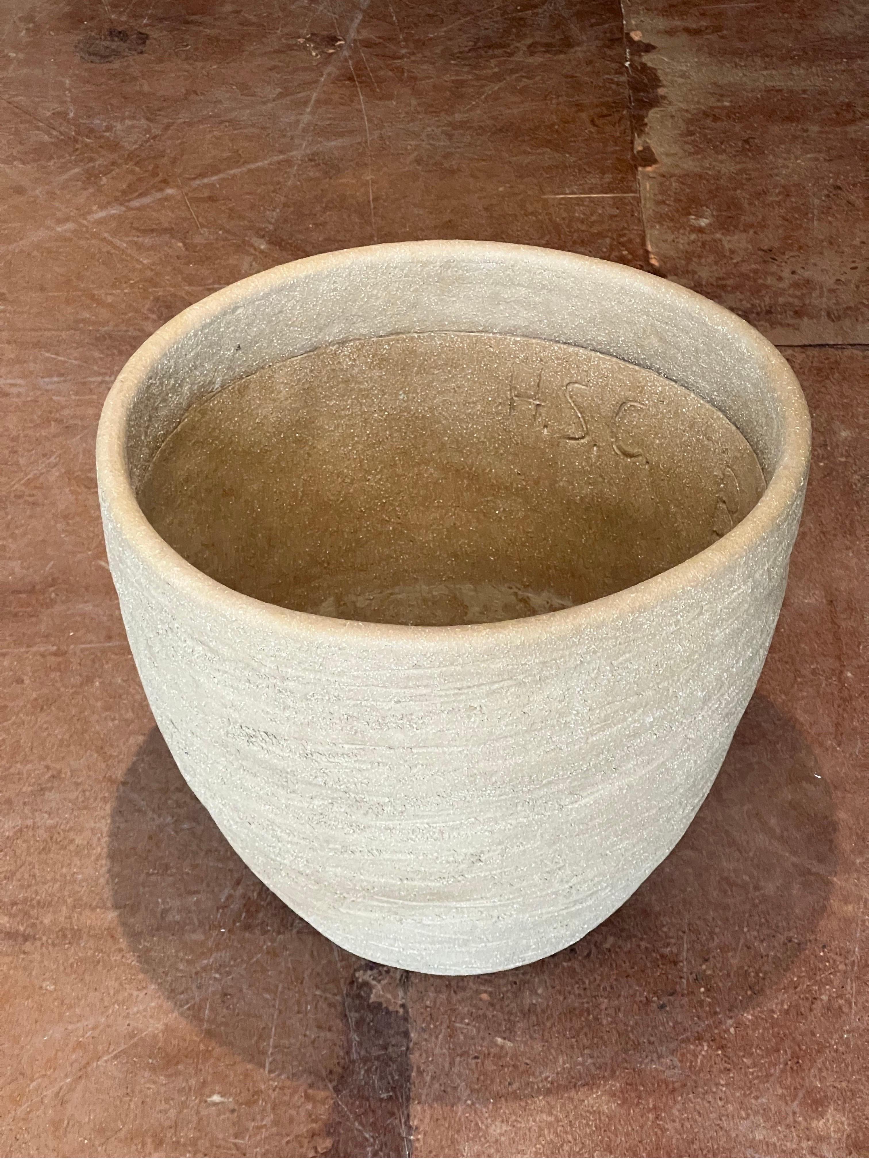 This Stan Bitters Scratch Pot is a striking piece of functional art, embodying the essence of mid-century California design. With a substantial presence, this large-scale pot stands 18 inches tall and spans 21 inches in diameter, making it an ideal