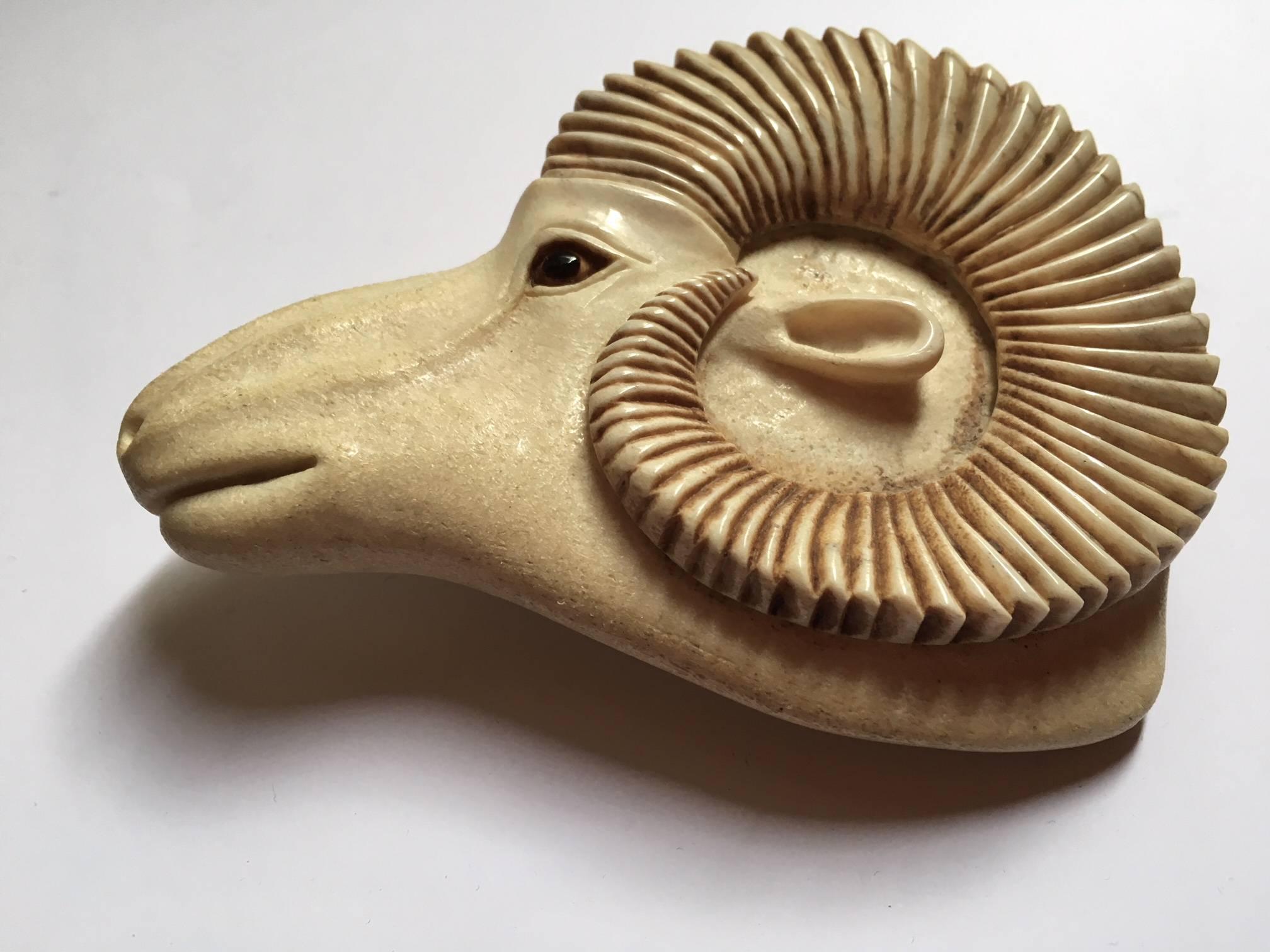 A Stan Hill, (1921-2003), fine carving of a mountain ram by Stan Hill,(1921-2003), Canadian artist based on the Conne River Reserve. His work is included in a number of public and private collection. Served as the chair of Aboriginal Artists of