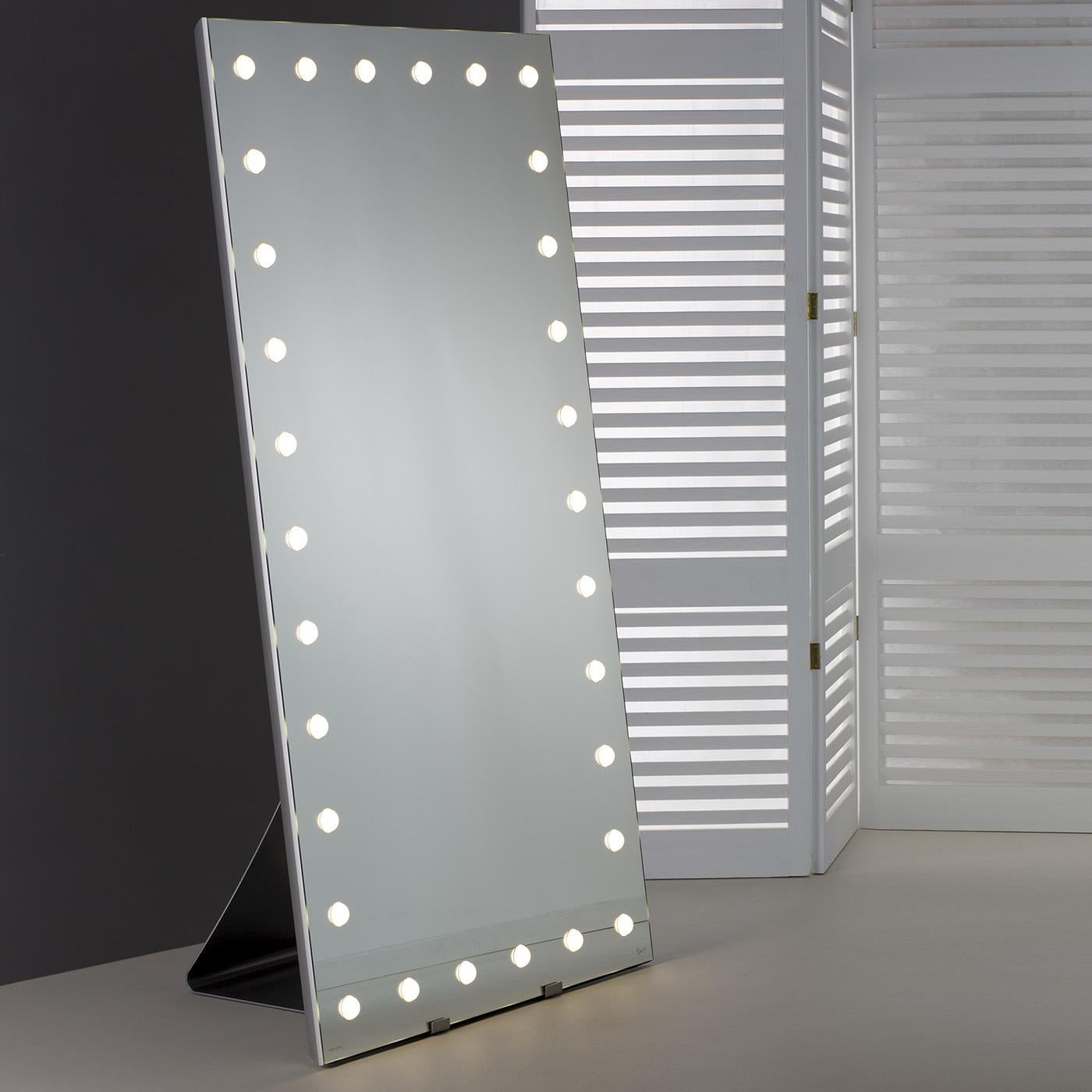 Elevating the style of any room, this free-standing floor mirror exudes glamorous and luxury with its impeccable design combining craftsmanship with technology. The slender profile (6.5cm thickness) enclosed in a lightweight, silver anodized