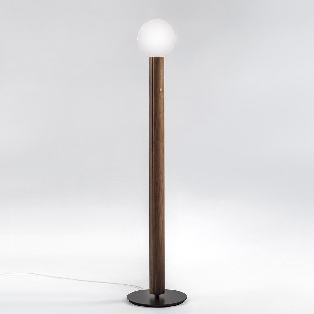 Floor lamp stand Art Medium with solid walnut wood pole on metal
base in bronze finish. With frosted white spherical shade diffuser in glass.
With 1 bulb, lamp holder type E27, max 10 watt, including a dimmable touch 
switch, bulb not included.