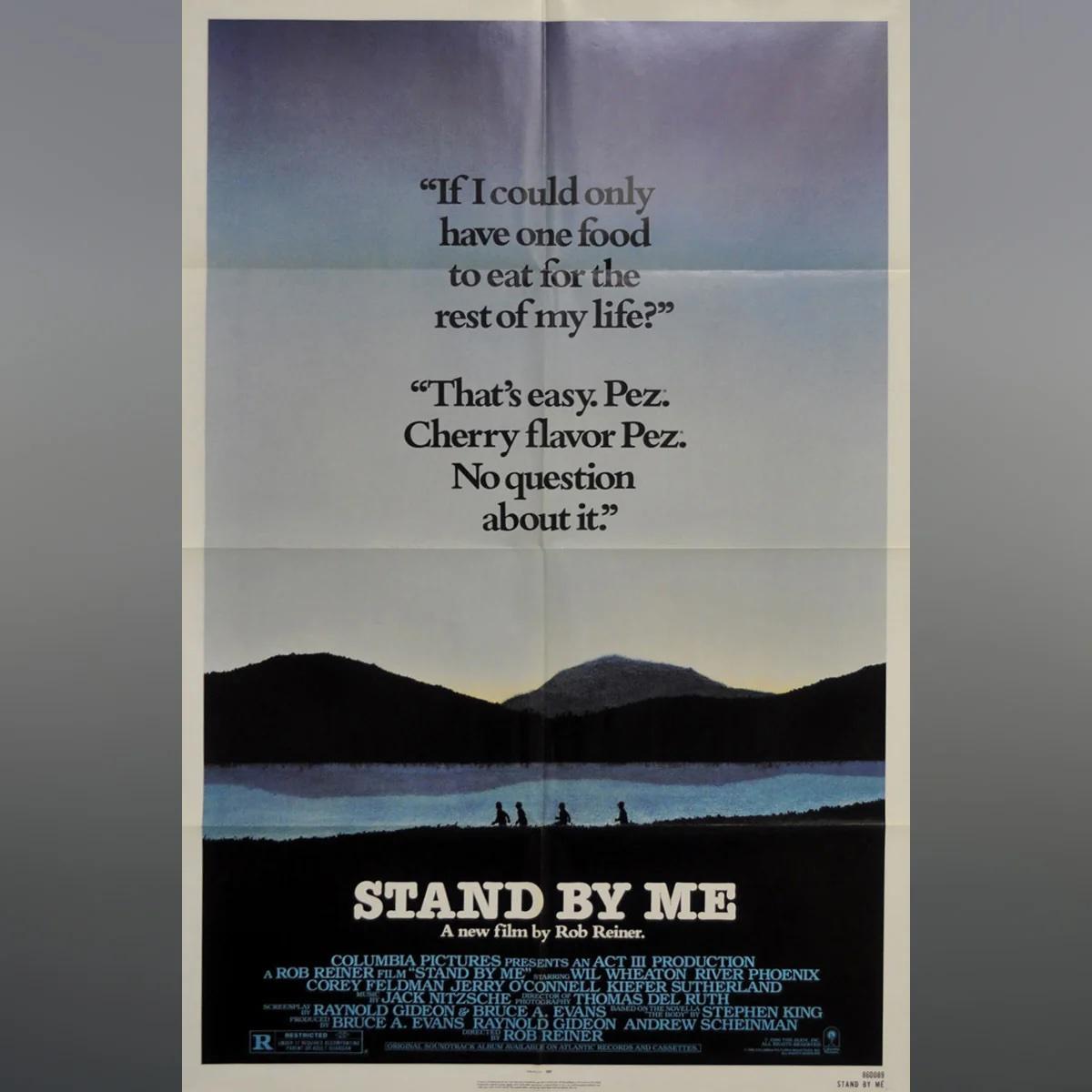 Stand By Me (1986)
Original Una Hoja (27 X 41 Pulgadas)

Tras enterarse de que un desconocido ha muerto accidentalmente cerca de sus casas rurales, cuatro chicos de Oregón deciden ir a ver el cadáver. Por el camino, Gordie Lachance (Wil Wheaton),