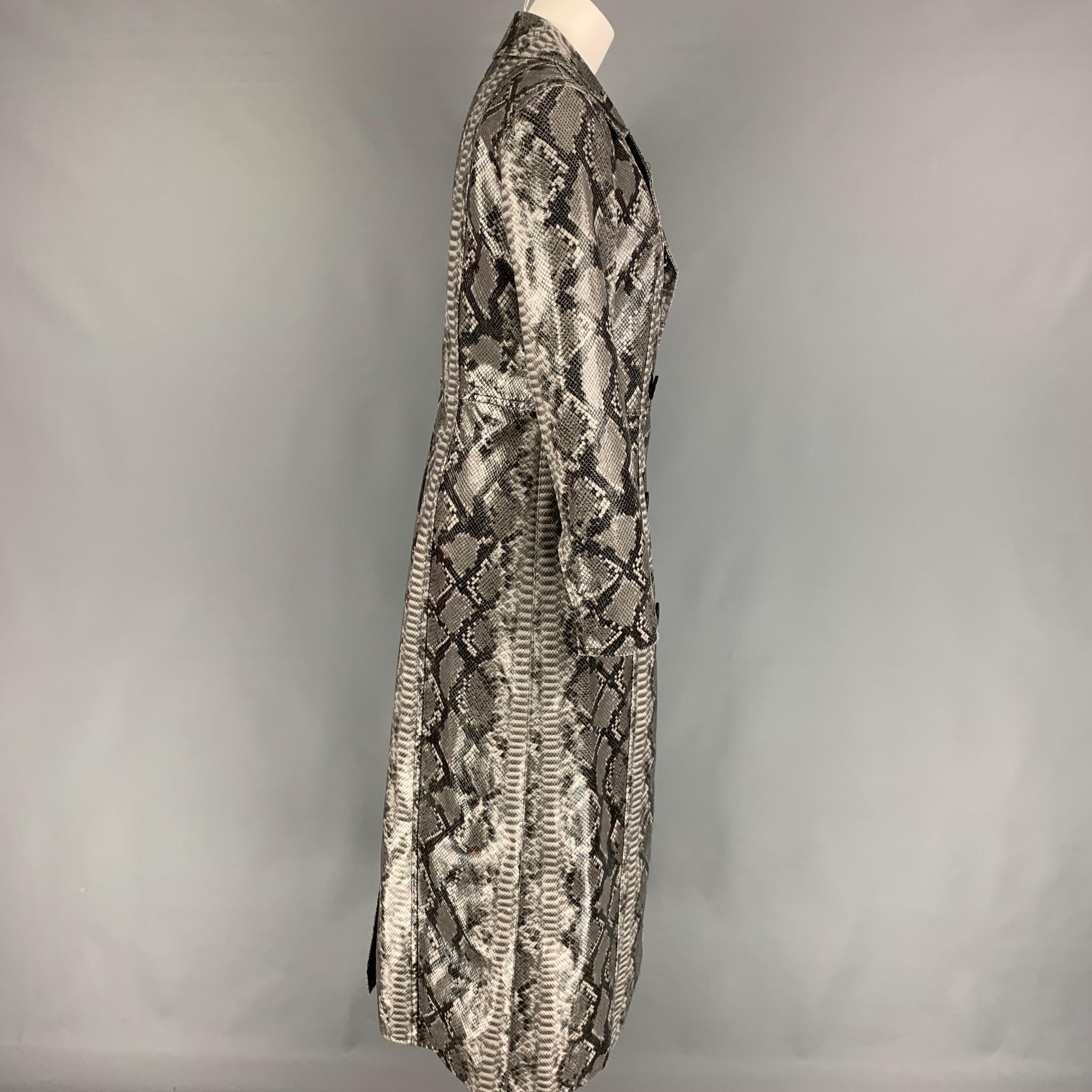 STAND STUDIO coat comes in a grey & black snake skin print polyester blend featuring a notch lapel, slit pockets, and a double breasted closure. 

Very Good Pre-Owned Condition.
Marked: 38

Measurements:

Shoulder: 15.5 in.
Bust: 35 in.
Sleeve: 24