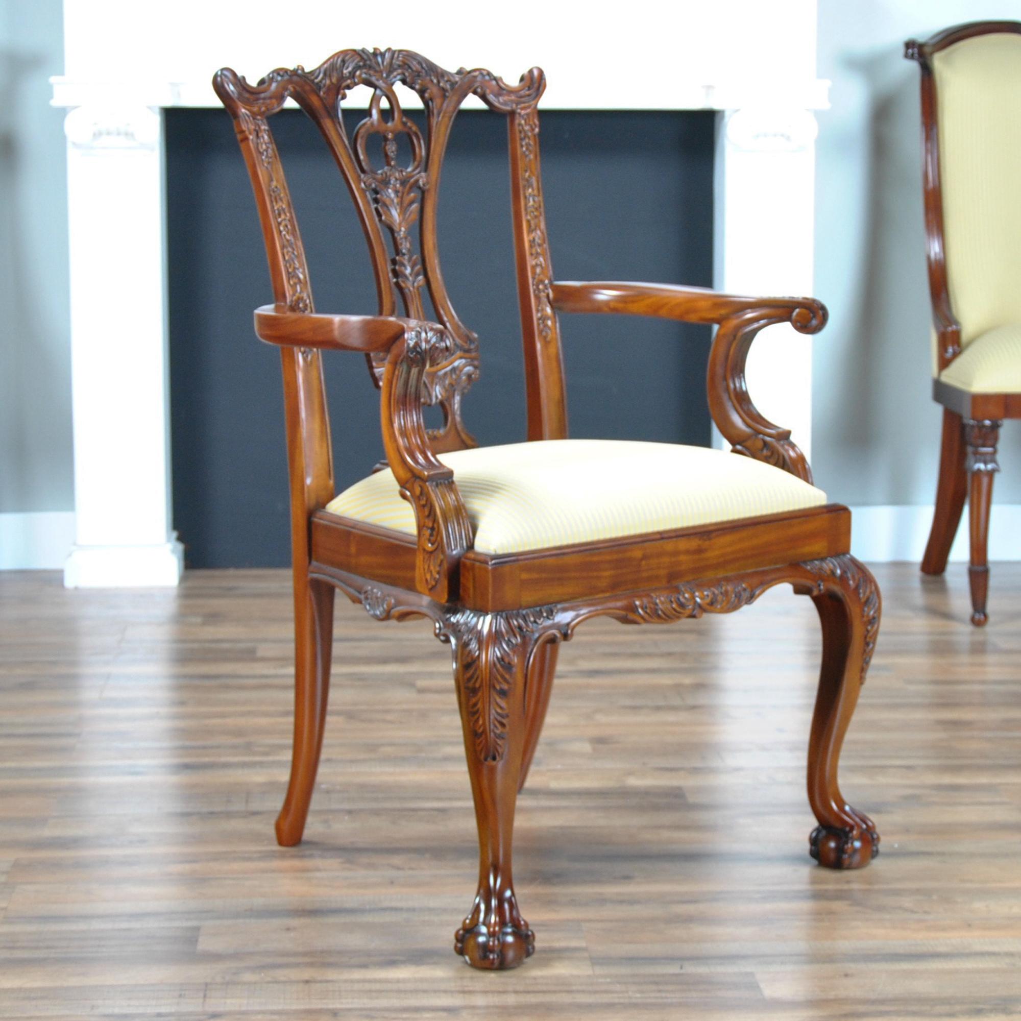 This set of ten Standard Chippendale Chairs has sold so well over the years that it has become known at our shop as the set of “Standard Chippendale Chairs”. A carved crest rail, foliate carved back splat, and legs featuring acanthus carvings as