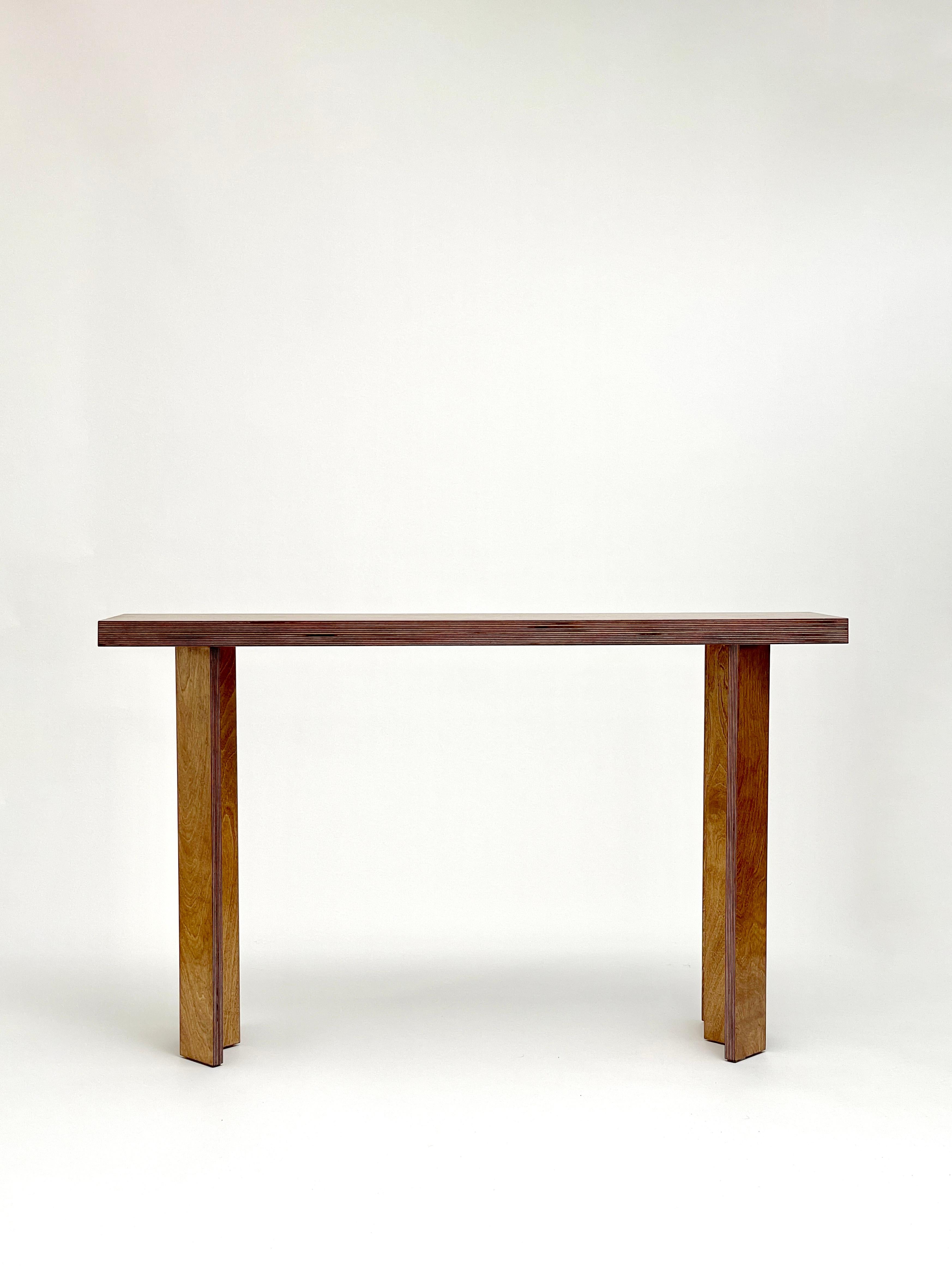 Standard Console table by Goons
Dimensions:  W 120 x D 27 x  H 74 cm.
Materials: Wood.
Dimensions can be adjusted +/- 10 cm. 

Goons is located in Paris, France. All of they're designs are made out of wood.