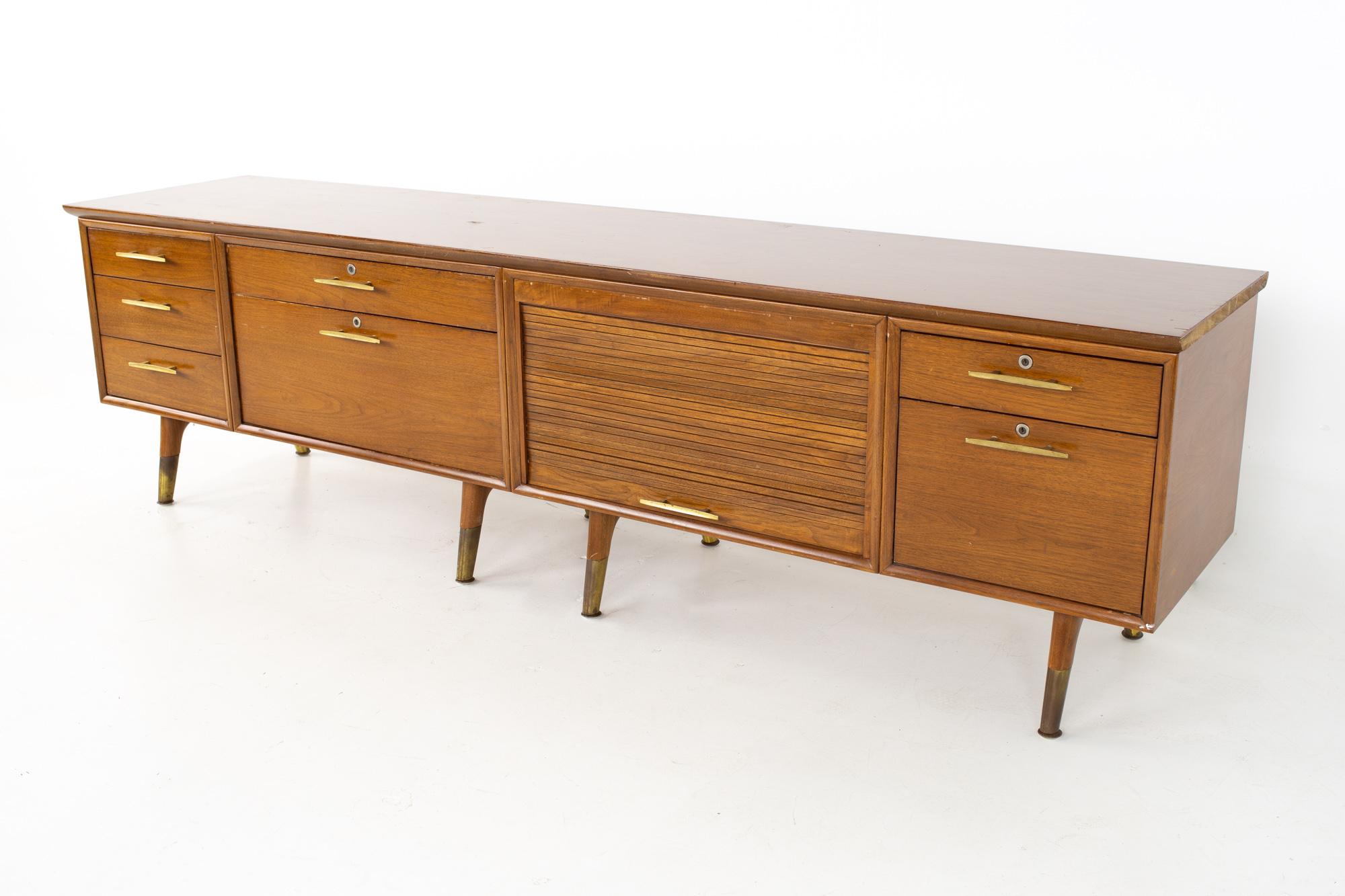 Standard Furniture Company mid century walnut and brass Tambour sideboard buffet credenza
Credenza measures: 95 wide x 21 wide x 27 inches high

All pieces of furniture can be had in what we call restored vintage condition. That means the piece