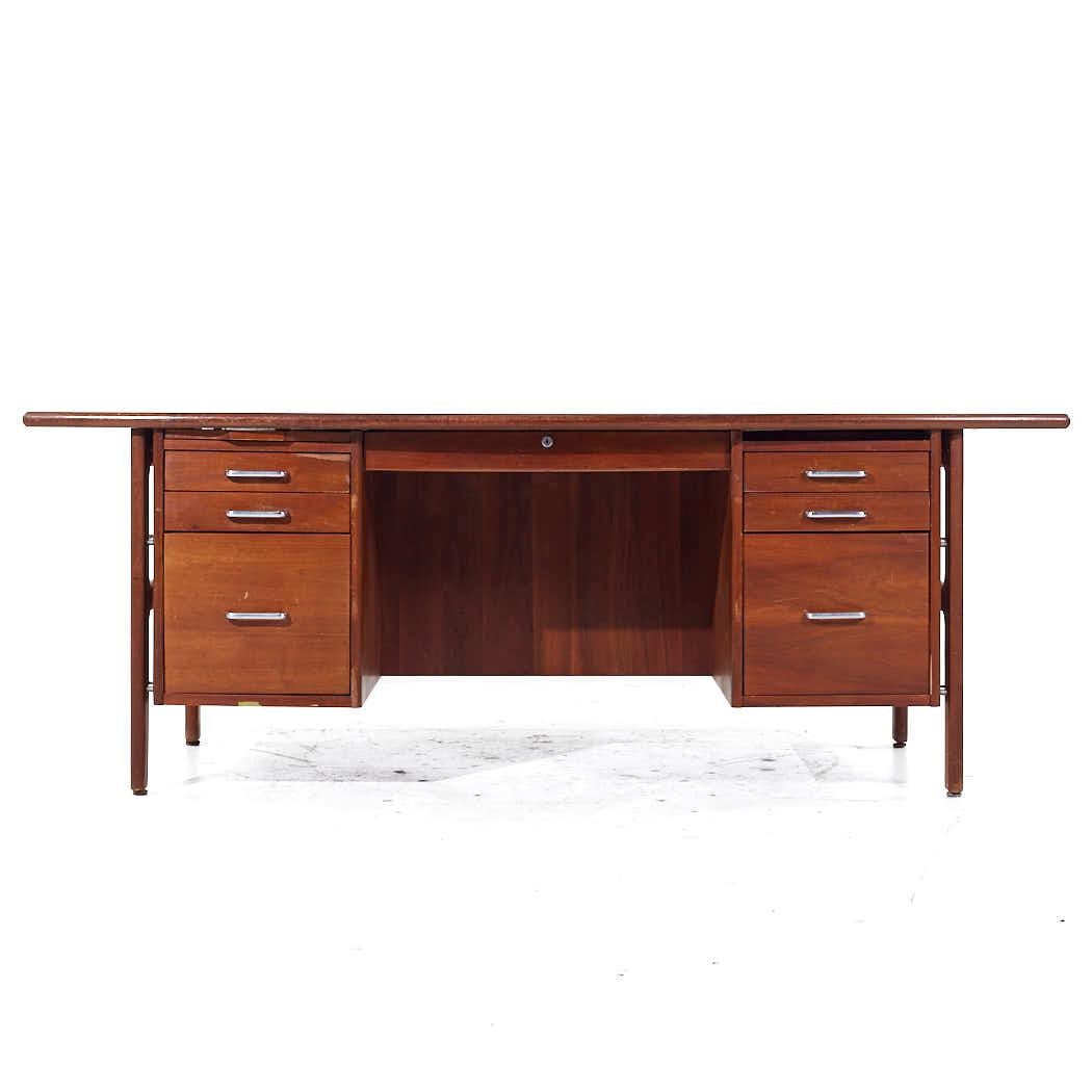 Standard Furniture Mid Century Walnut Executive Desk

This desk measures: 79.75 wide x 40 deep x 29.25 inches high, with a chair clearance of 24.75 inches

All pieces of furniture can be had in what we call restored vintage condition. That means the