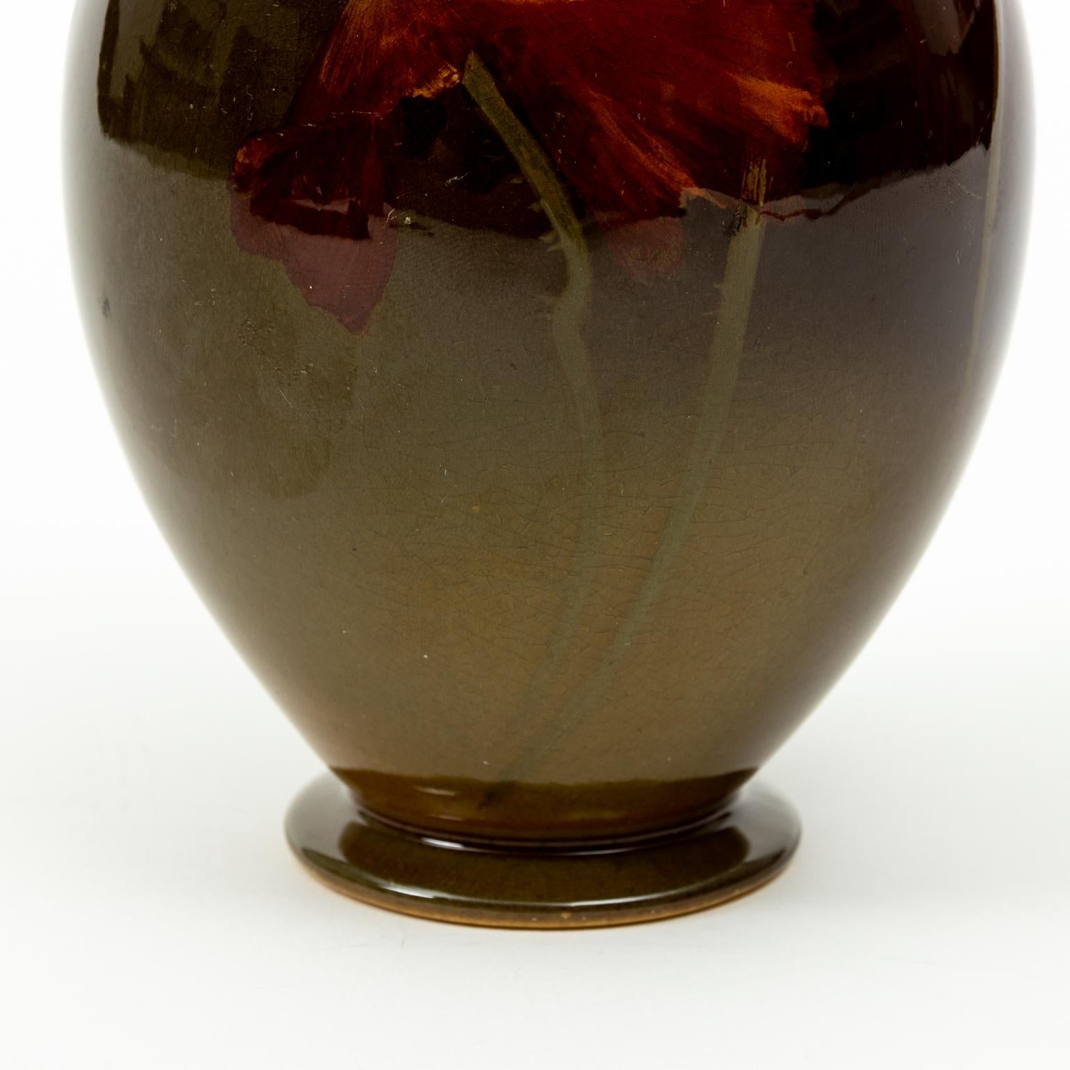 Circa 1901 standard glazed Rookwood vase painted by Irene Bishop in 1901. It depicts a flower and is fully sized. Made in the United States. Please note wear consistent with age.