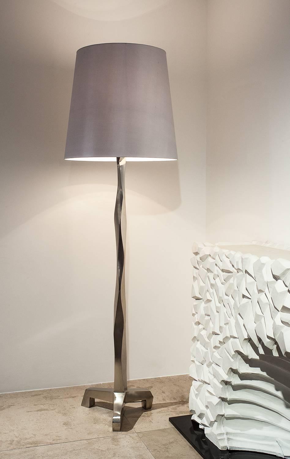 Garouste & Bonetti
Standard lamp 'Masai' 
1999
Patinated / brushed nickel 
Measures: H 215 x D 43 cm / H 84.6 x D 16.9 in.

For EU buyers this piece is subject to a 20% VAT tax, which will be added to the price after the order has confirmed.