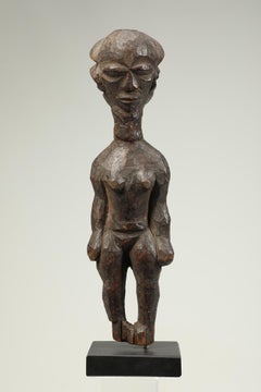 Standing Female Pende Wood Figure with Arms at Sides Cascading Hair Congo
