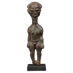 Standing Female Pende Wood Figure with Arms at Sides Cascading Hair Congo