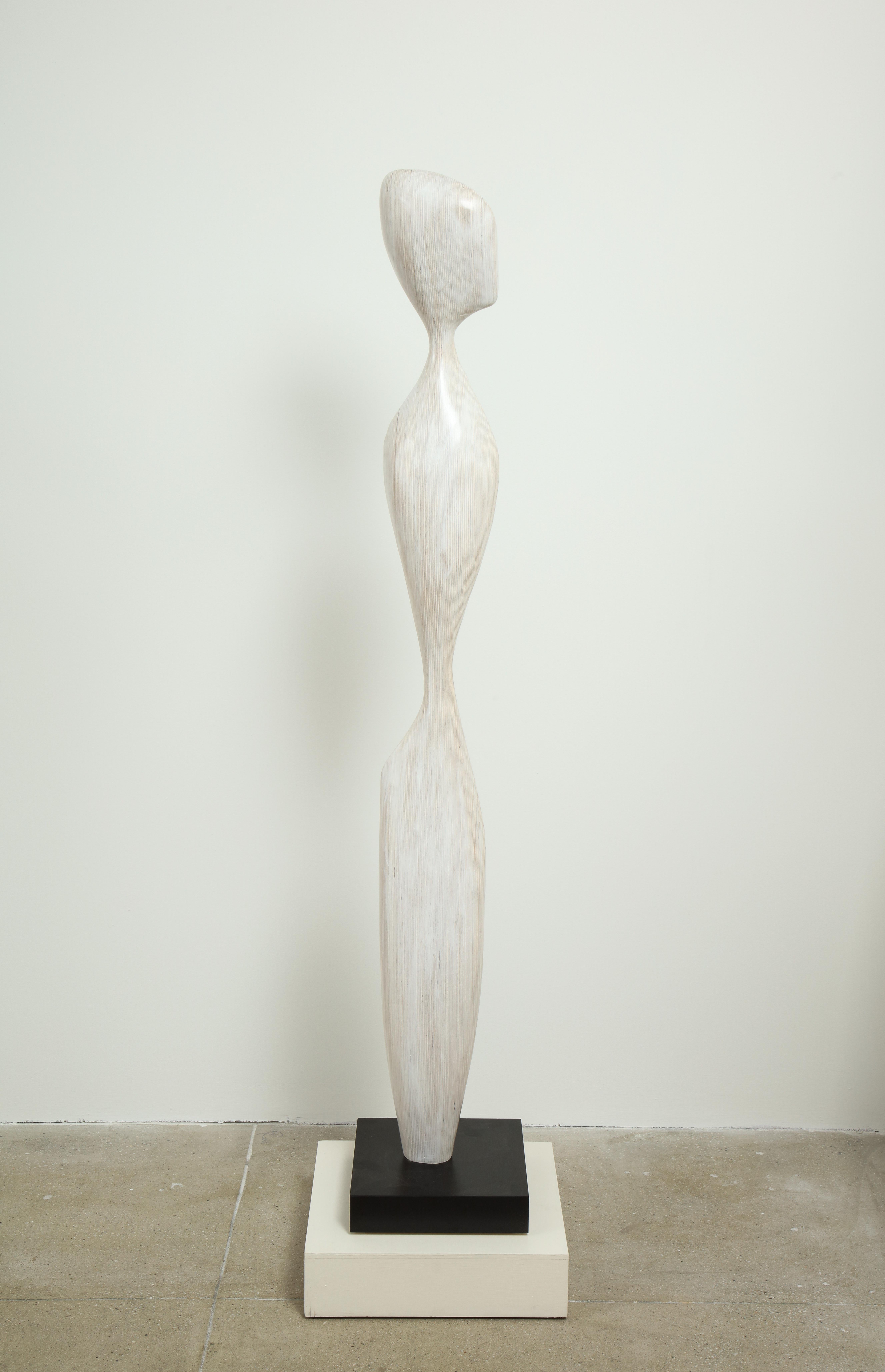 'Standing Figure' by Dick Shanley 
Medium: Laminated birch wood mounted on a black granite square base
Signed: DS 
Size: 67