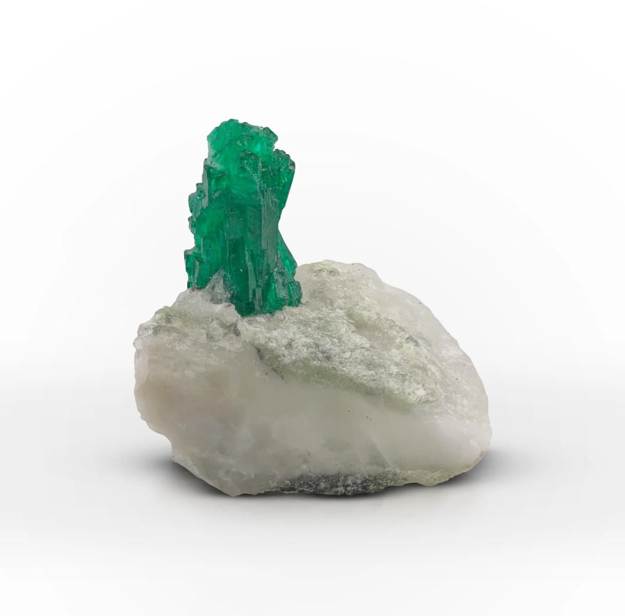 Product Information:

Specimen Type: Emerald Crystals on Matrix

Weight: 32 grams

Dimension: H: 4.2 x W: 3.8 x D: 2.6 cm 

Origin: Pakistan

Treatment: None

Description:

This exquisite specimen features deep green emerald crystals embedded in a