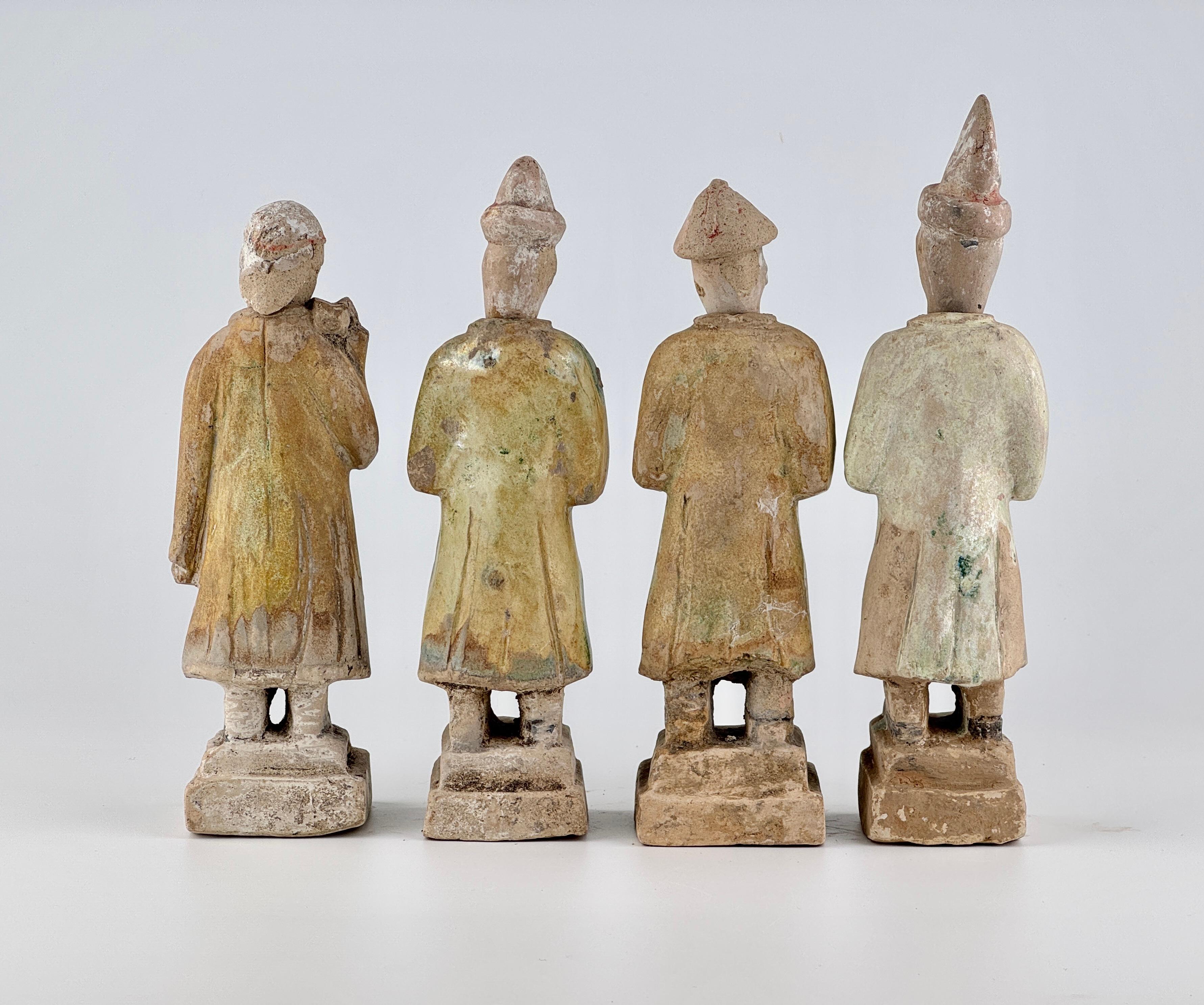 Hong Kong Four Green Glazed Pottery Attendant Figures, Ming Dynasty(1368-1644) For Sale