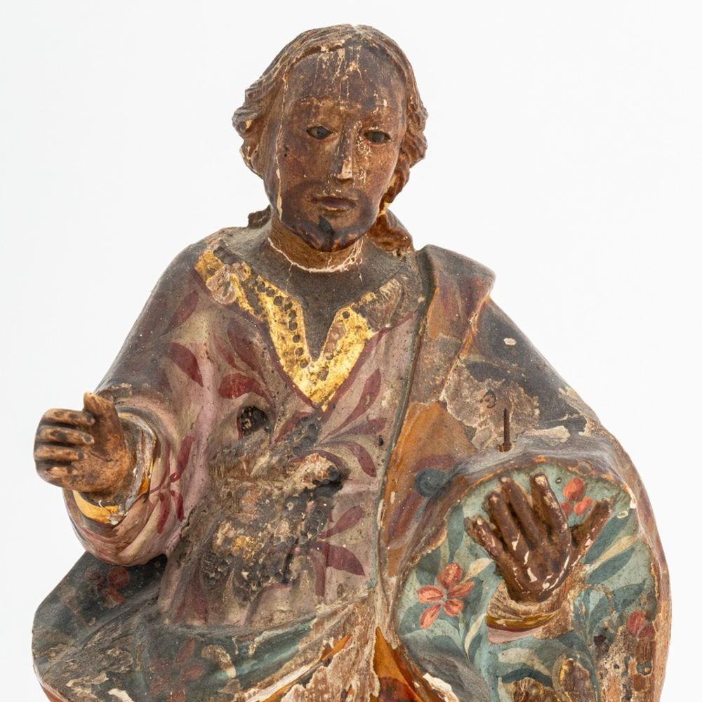 Standing Saint Polychrome Painted and Carved Wood Sculpture, 19th century, probably Spanish Colonial, with hand-painted gilt accents. 12.75
