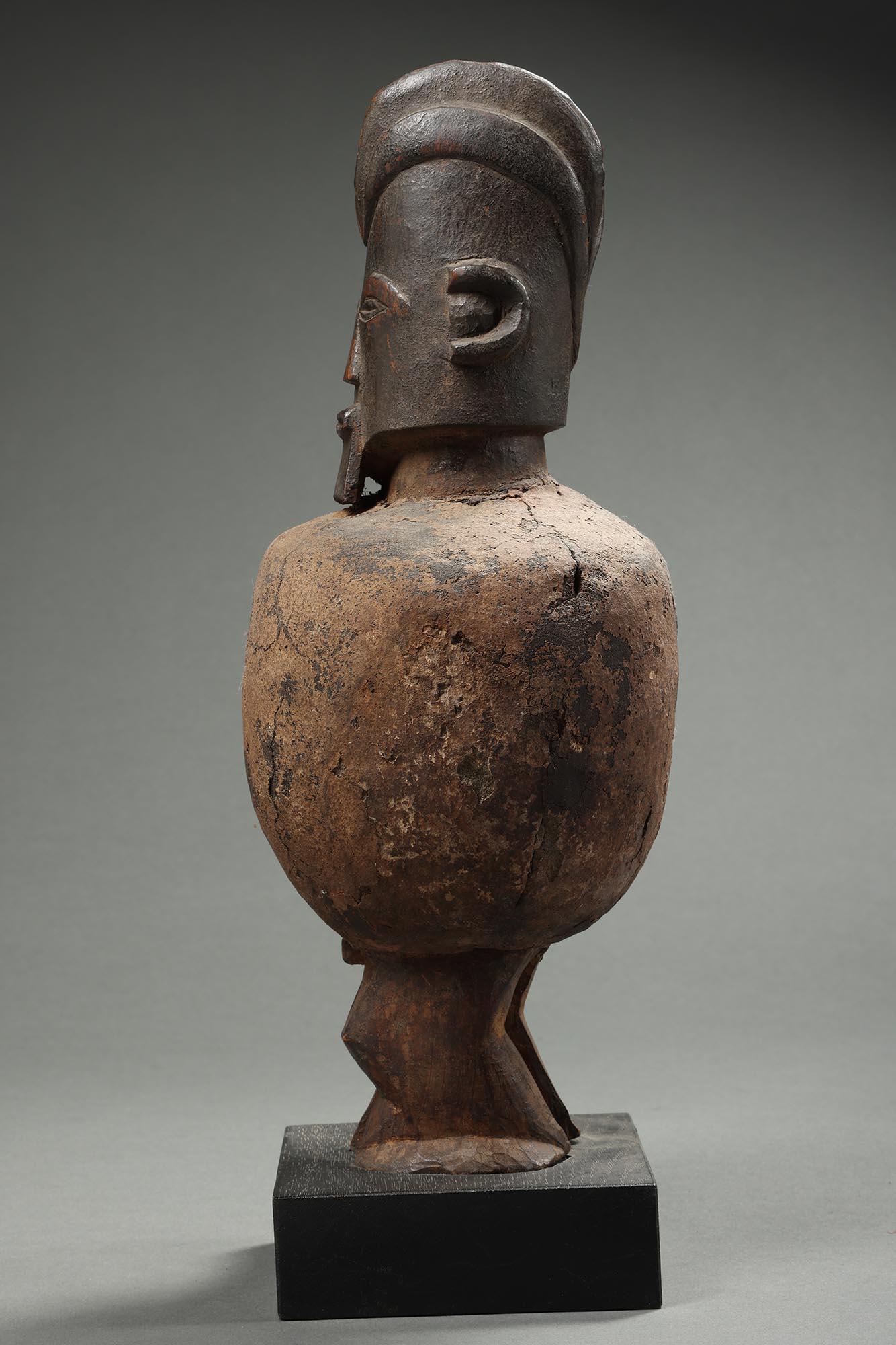 Hand-Carved Standing Teke Fetish Figure with Hard Clay Bundle DRC Congo, Africa ex J Willis For Sale