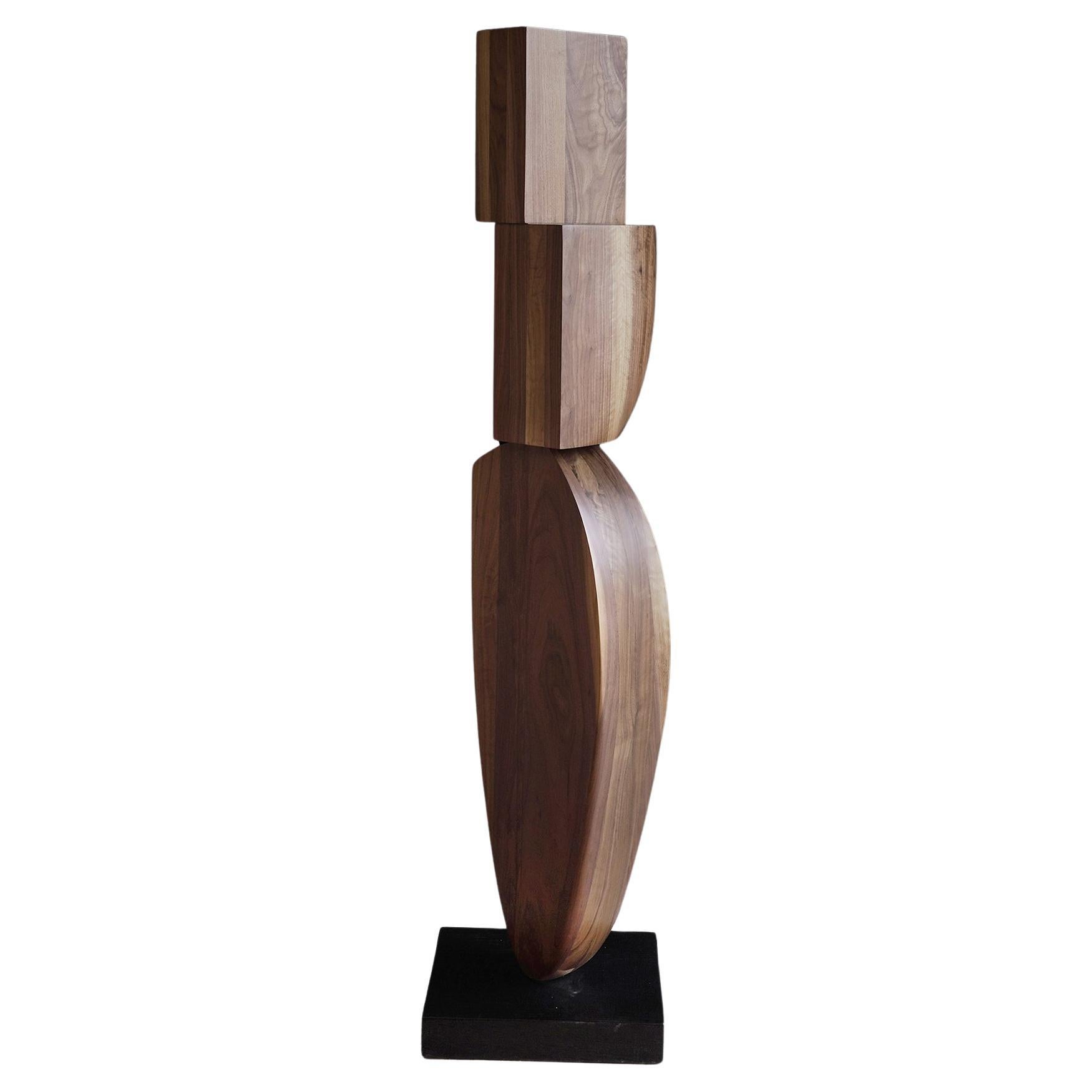 Sculpture de totem sur pied en bois, support continu n°3 de Joel Escalona