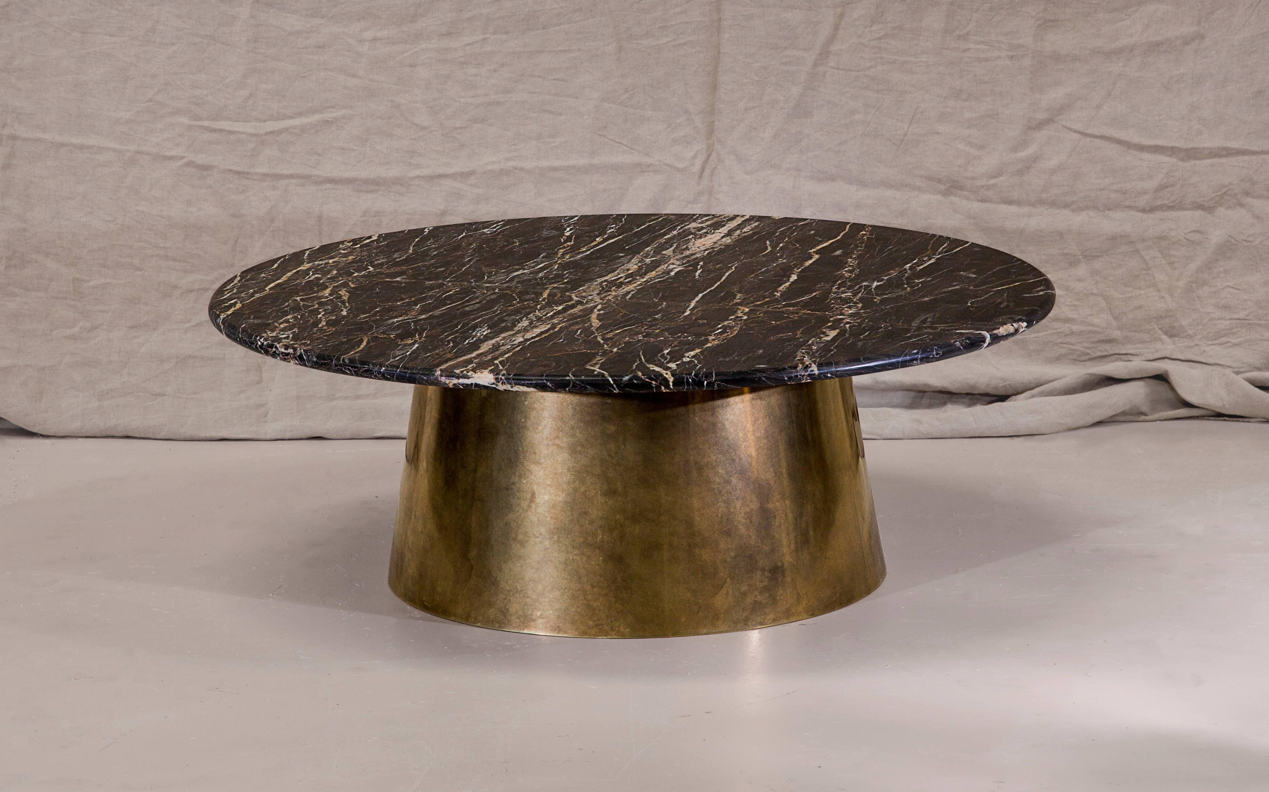 A circular coffee table in incredibly rare British marble and patinated brass. Hand crafted to order in the North. 

Measures: 100cm dia x 35cm height.
Custom finishes and sizes available upon request. 

Made to order in 12 weeks.
Price