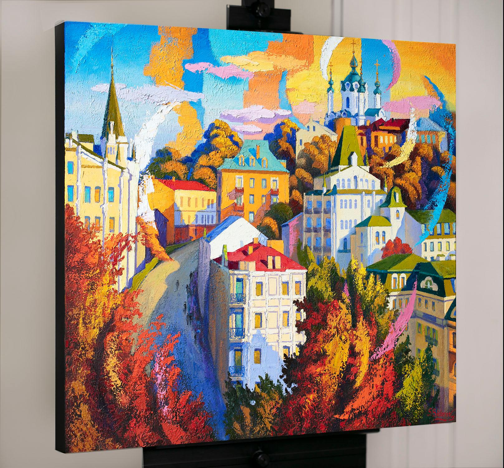 <p>Artist Comments<br>As part of his Cityscape Series, artist Stanislav Sidorov captures Andreevsky Spusk Street with a vibrant palette. The cathedral oversees the city, its bells ringing for residents and tourists alike. The golden glow from the