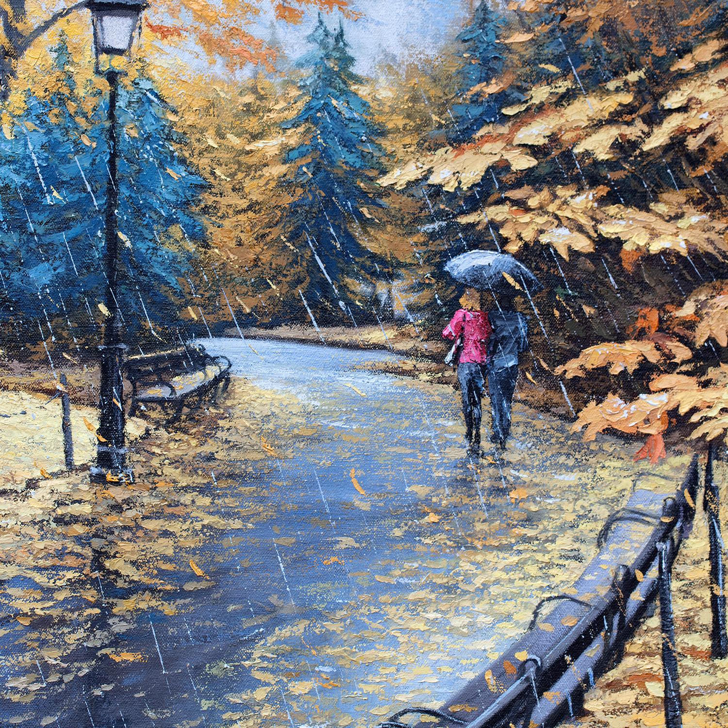 <p>Comentarios del artista<br>Las hojas doradas del otoño cubren los caminos de Central Park, preparando el escenario para un paseo romántico. Una pareja camina de cerca, compartiendo un paraguas azul mientras deja atrás uno rosa. La lluvia