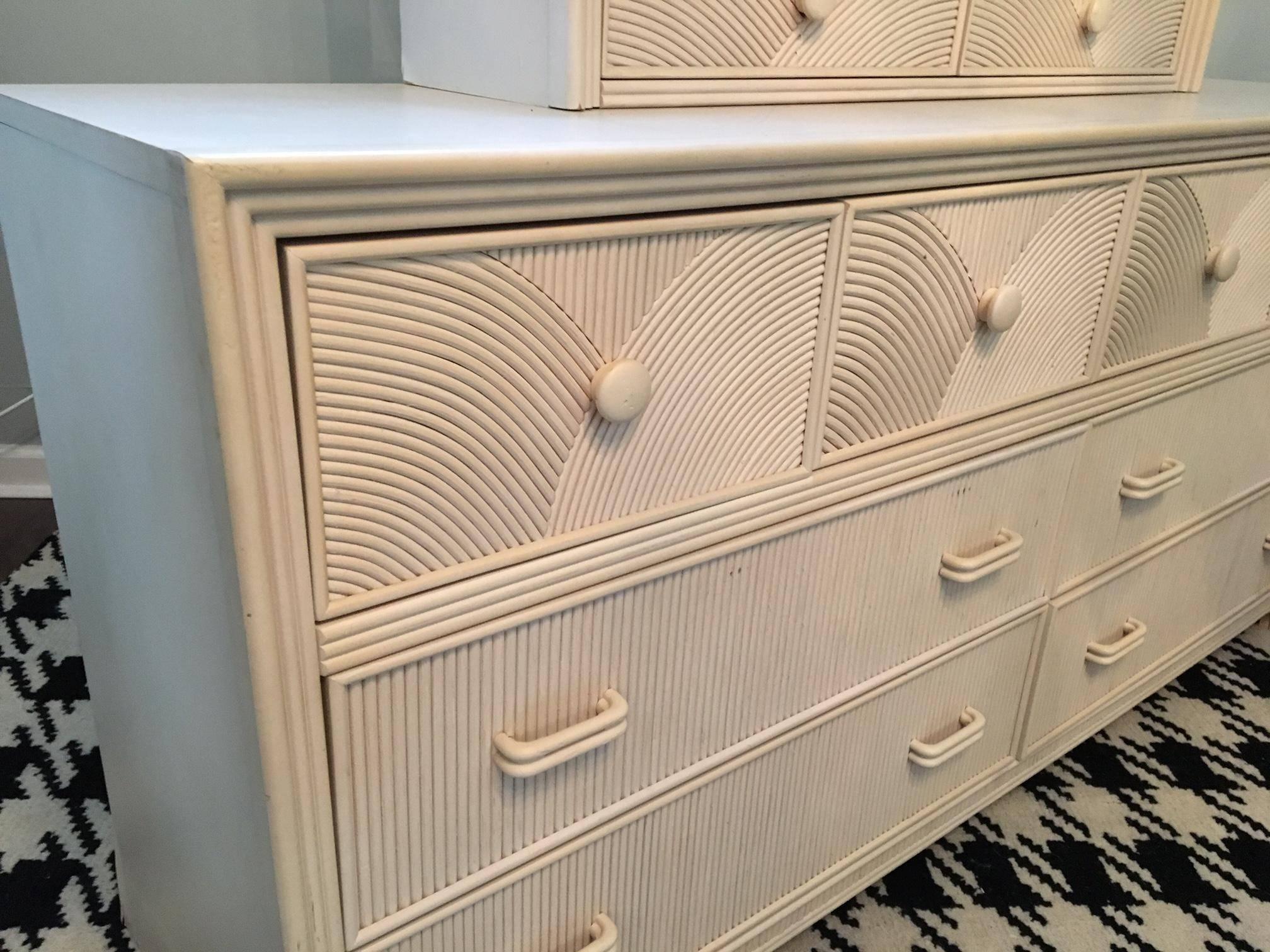 Pencil reed front dresser by Stanley Furniture features unique pattern design on drawer fronts and matching adjustable mirror. Excellent vintage condition.