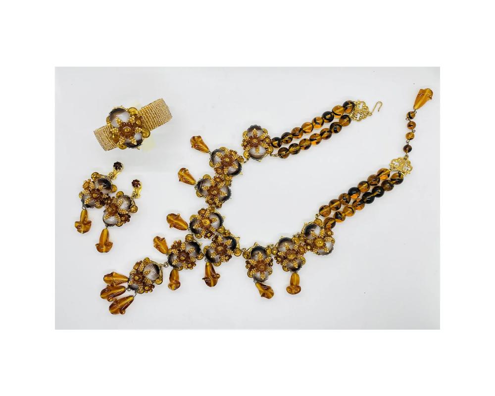 STANLEY HAGLER NYC Brass Tiger Eye Glass Drops Beaded Necklace Bracelet and Earrings Set

This is a huge set 
Comes with Necklace, Bracelet,, and Earrings 
In Great condition

The Set is fully Signed you can see in the photos

The Bracelet is