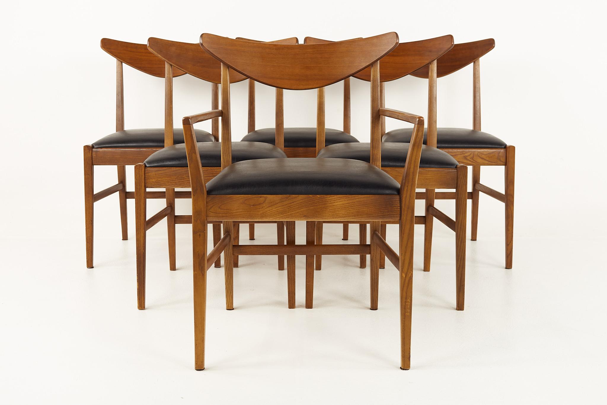 Stanley mid century walnut cats eye dining chairs - set of 6

Each chair measures: 19 wide x 17 deep x 33 inches high, with a seat height of 19 and arm height of 24 inches

All pieces of furniture can be had in what we call restored vintage