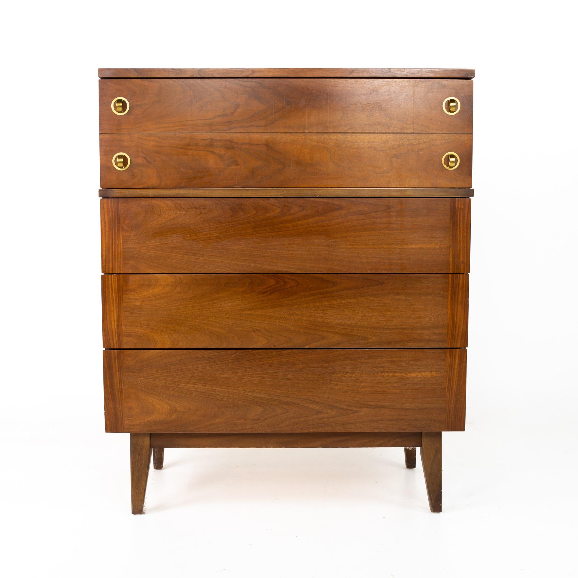 Stanley Mid Century walnut and brass highboy dresser
Dresser measures: 34 wide x 18 deep x 42.5 inches high

This price includes getting this piece in what we call restored vintage condition. That means the piece is permanently fixed upon purchase