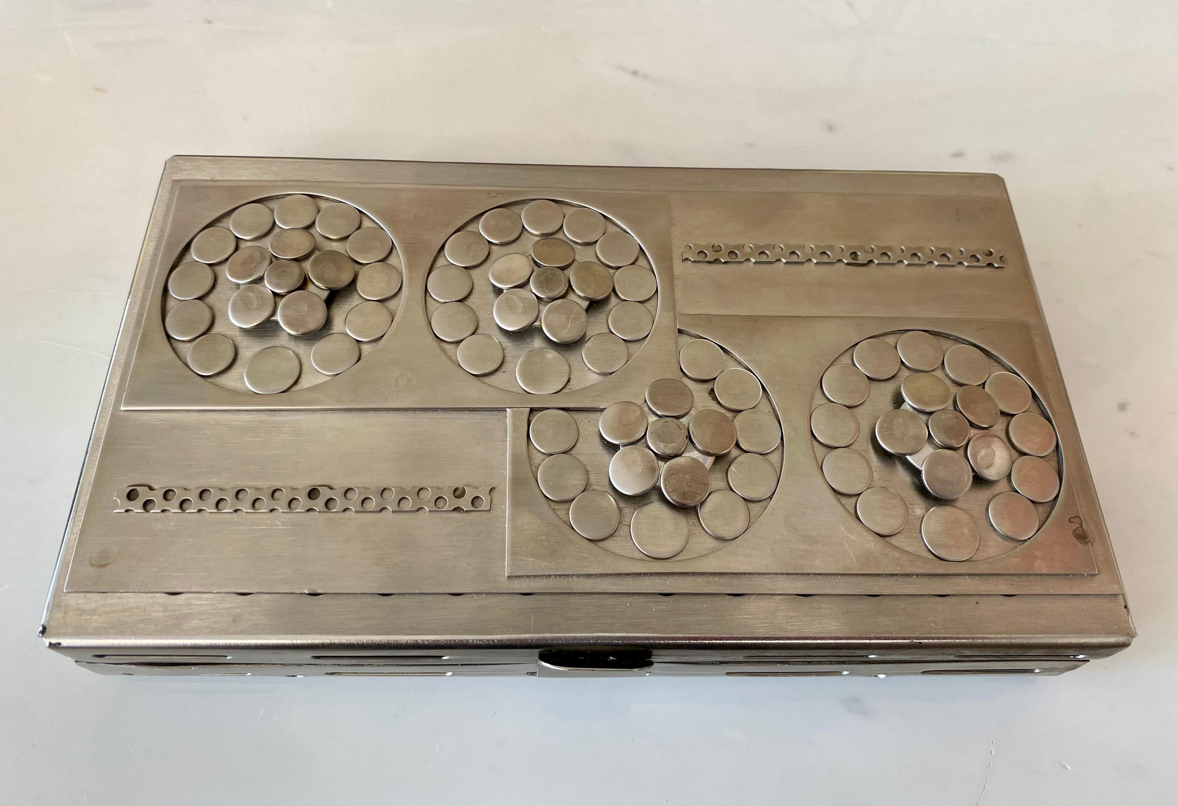 Beautiful set of 7 stainless steel boxes by Stanley Szwarc, unsigned. measuring 8