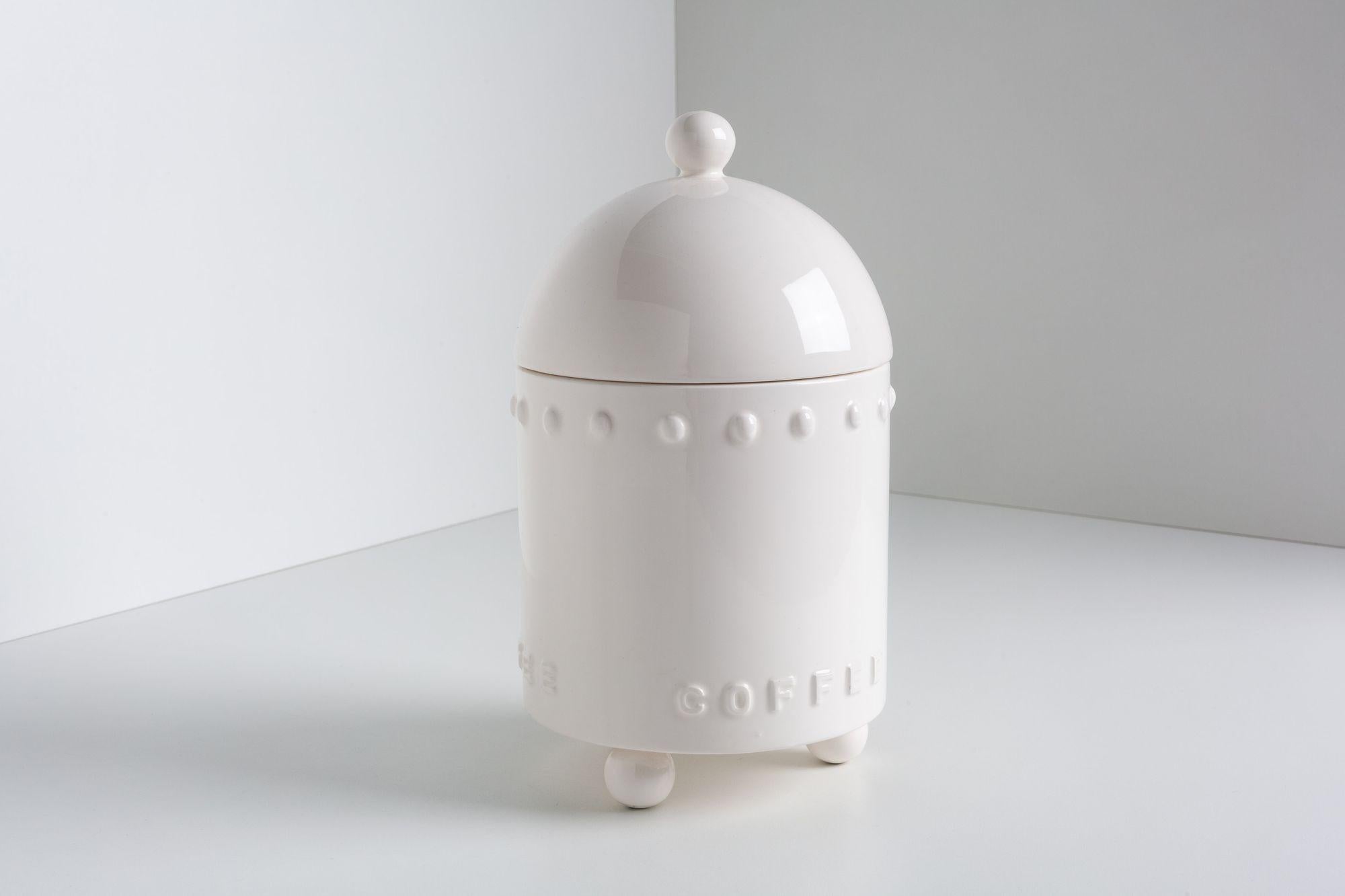 white ceramic coffee canister